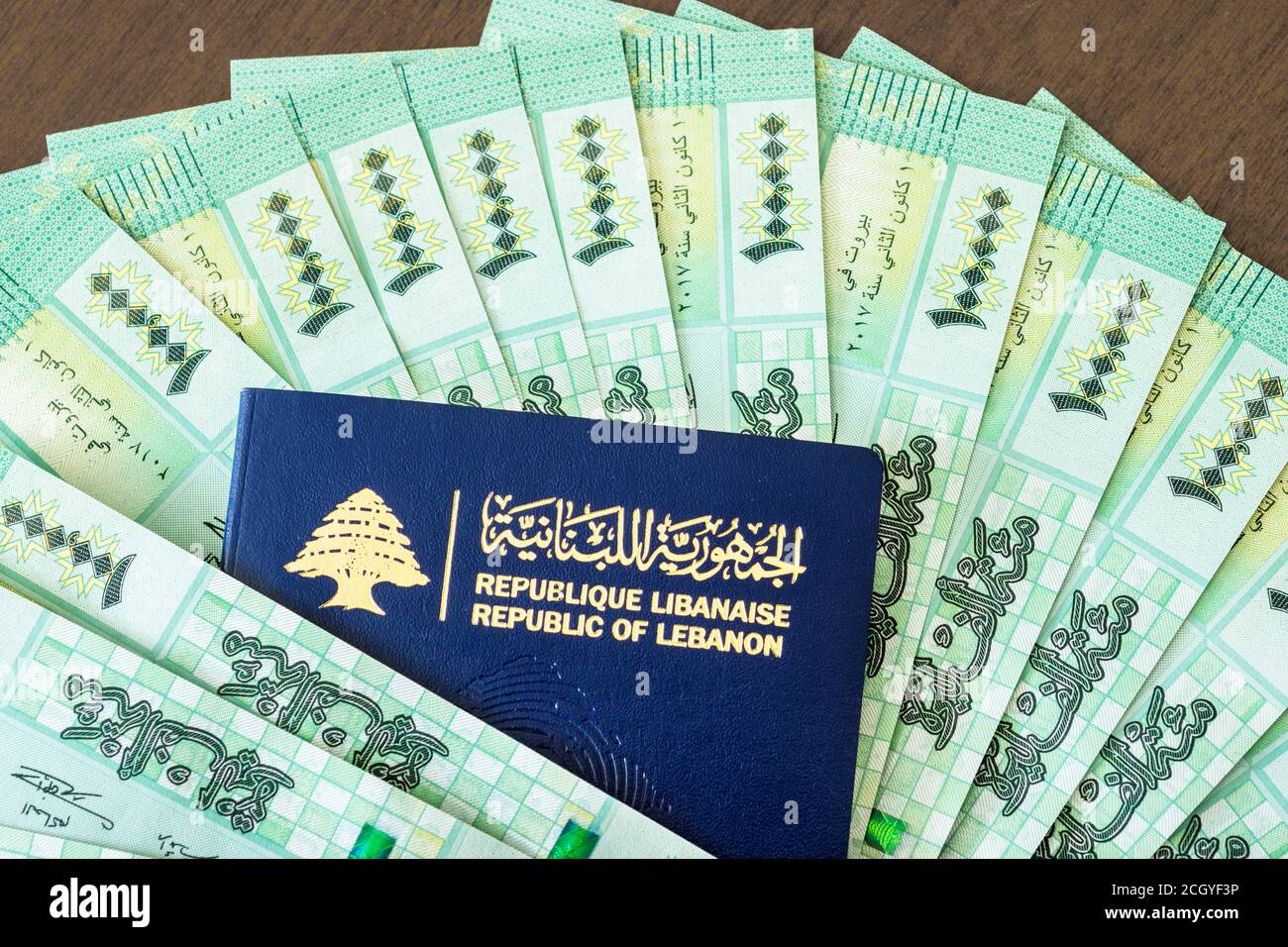 Lebanese passport with Lebanese pounds bills Stock Photo Alamy
