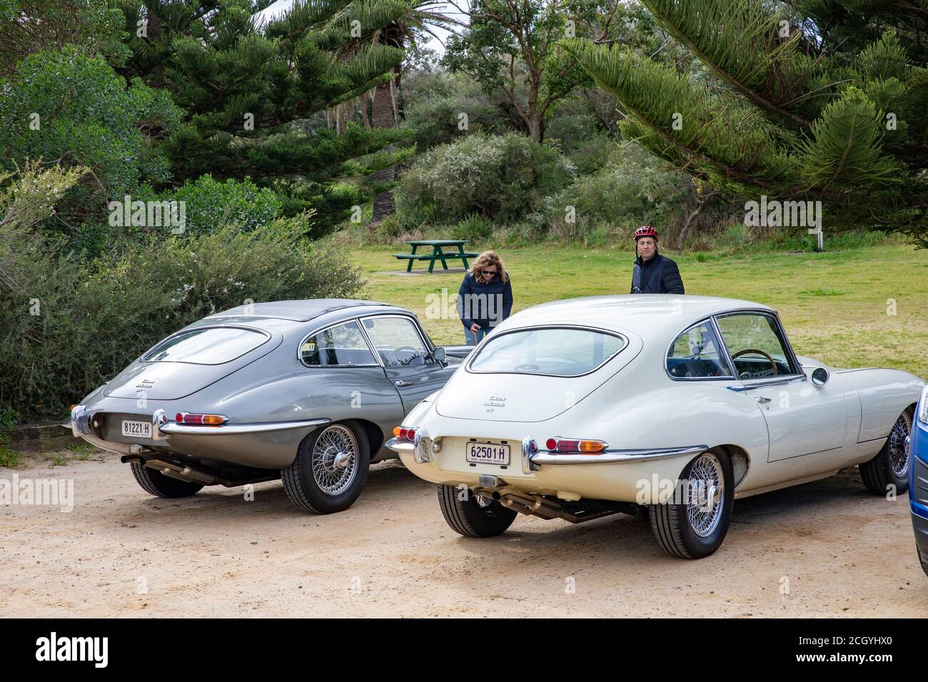 Two classic series 1 jaguar e type coupe cars ,1965 model on the left and 1967 jaguar e type coupe,Sydney,Australia Stock Photo