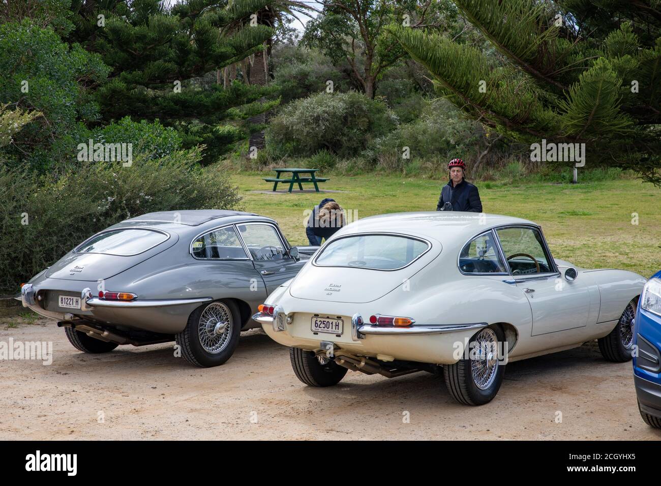 Two classic series 1 jaguar e type coupe cars ,1965 model on the left and 1967 jaguar e type coupe,Sydney,Australia Stock Photo