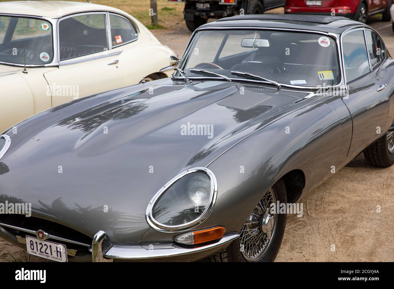 Two E type jaguars classic cars parked in Palm beach,Sydney,Australia Stock Photo