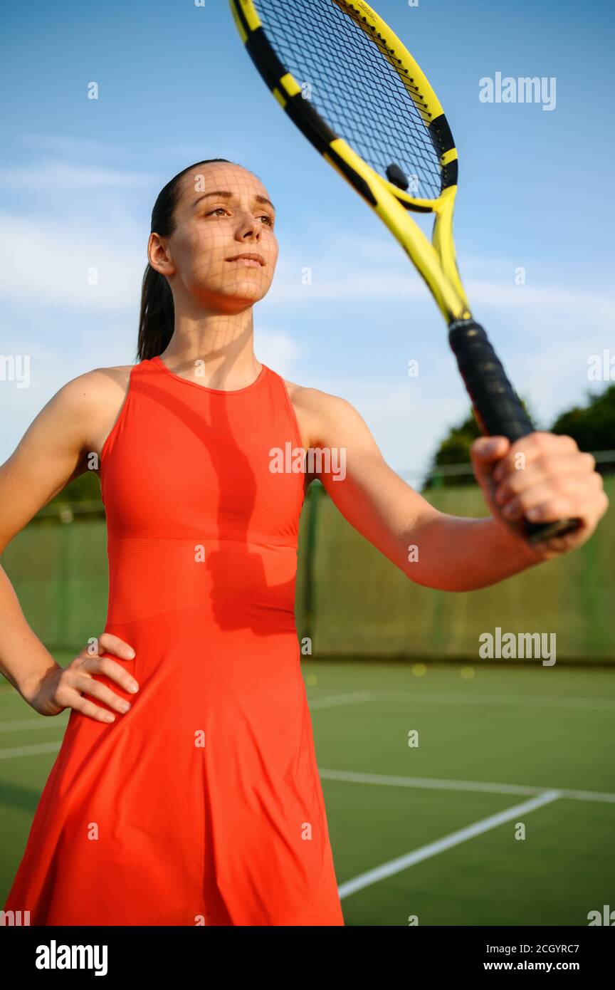 Female tennis player with racket on outdoor court Stock Photo Alamy