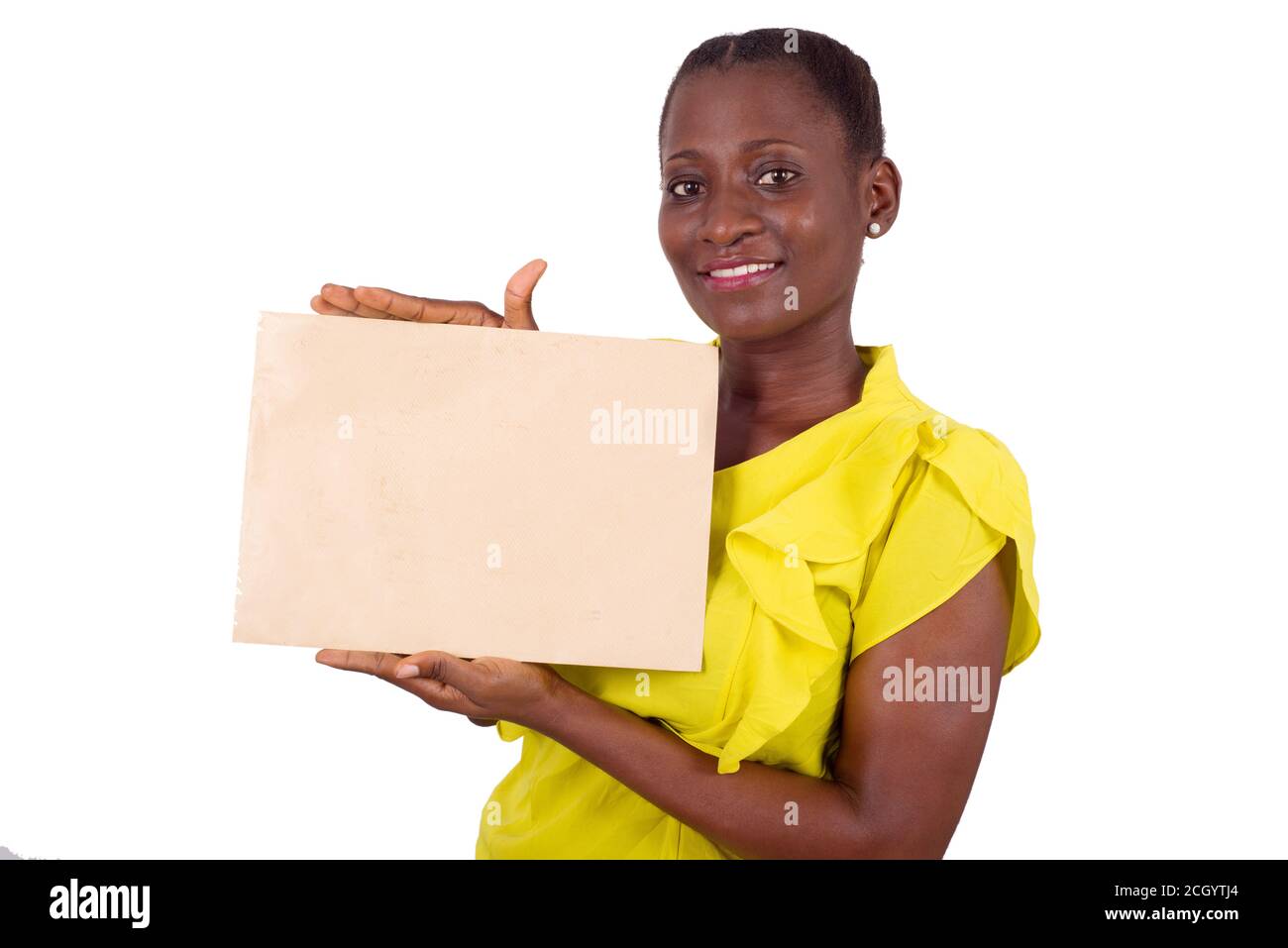 Smiling woman showing a blank sheet of paper with copy space for ...