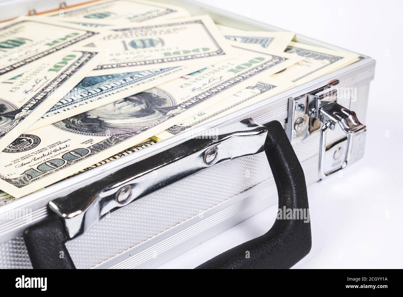 A lot of American Banknotes Dollars money in a metal suitcase. Bank payment symbol Stock Photo
