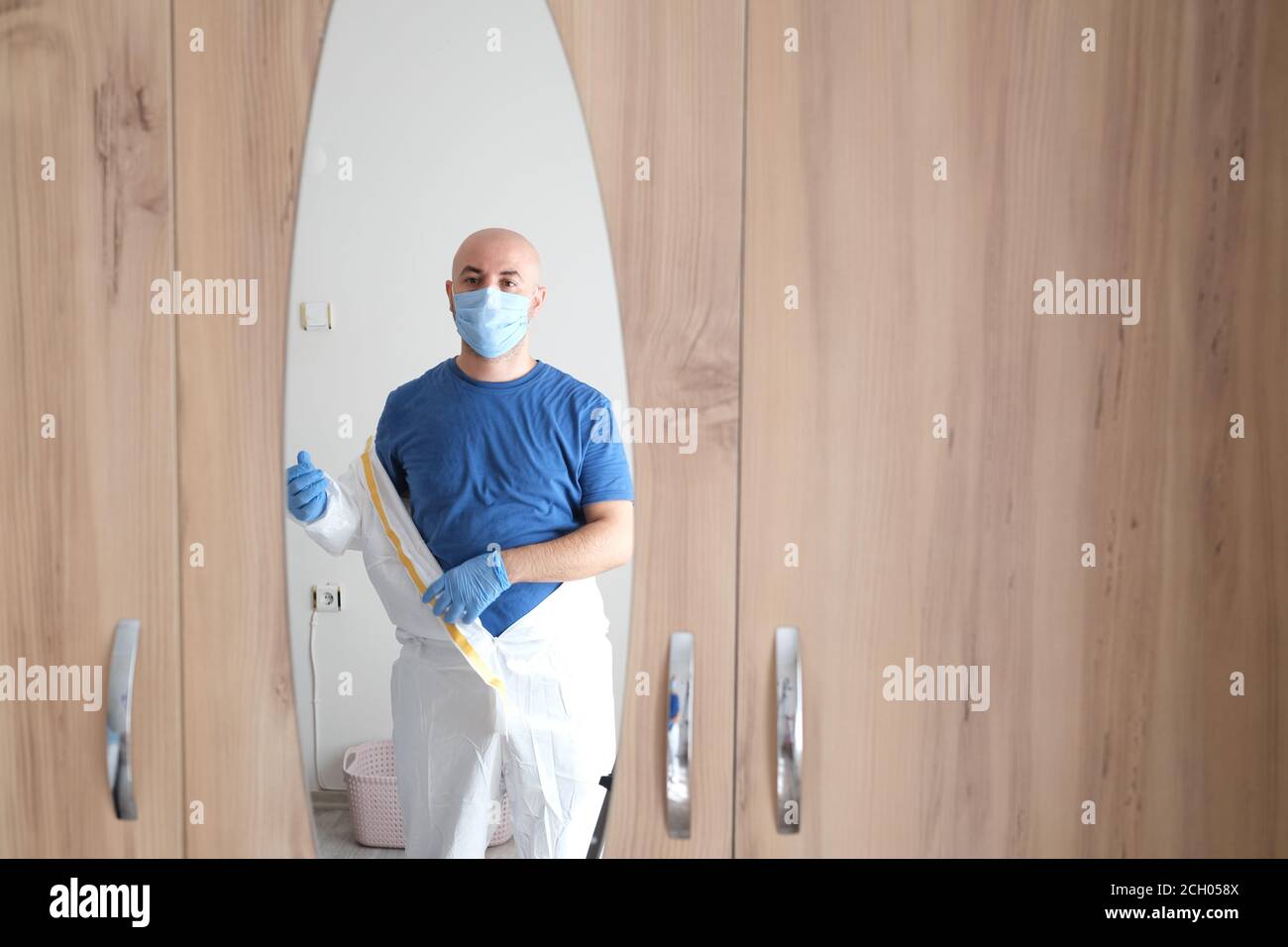 Young doctor wearing a protective suit. professional doctor. Stock Photo