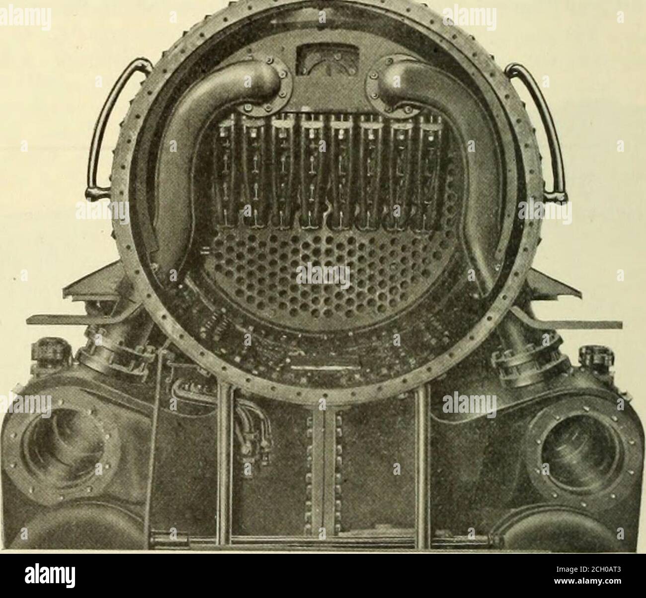 . Railway and locomotive engineering : a practical journal of railway motive power and rolling stock . th the branch steam pipesthat lead to the cylinders. The joints of the pipe coils to the lowerface of the header are held in place bybolts, the heads of which are shown onthe upper face of the header, the lower pipe to the branch steam pipes the tem-perature of the steam is increased by itsnear contact with the heated gases findingtheir way through the enlarged flues.The use of the brick arch in connectionwith the superheater is favorable to ahigher degree of superheat. As is wellknown, the b Stock Photo