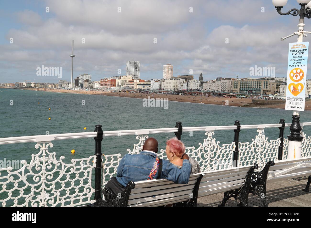 Brighton, UK. 13th Sep, 2020. UK Weather. Visitors and locals are enjoying the sunny day by the sea. Hot air from continental Europe drives up temperatures to an unusual September level. Credit: Uwe Deffner/Alamy Live News Stock Photo