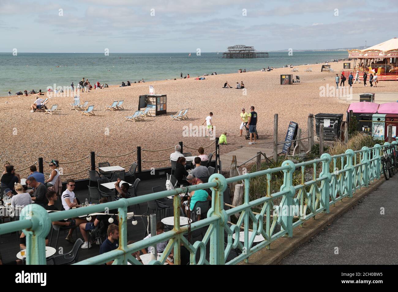 Brighton, UK. 13th Sep, 2020. UK Weather. Visitors and locals are enjoying the sunny day by the sea. Hot air from continental Europe drives up temperatures to an unusual September level. Credit: Uwe Deffner/Alamy Live News Stock Photo