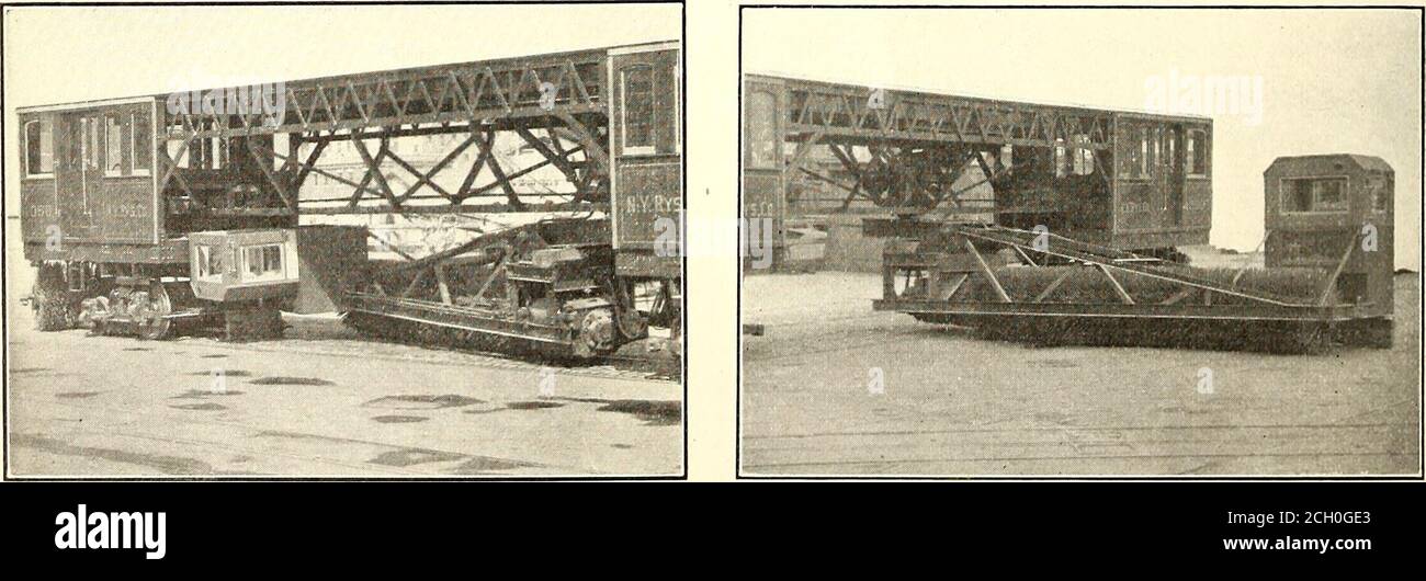 . Electric railway journal . eper-car consists of two cabs mounted on standardtrucks and connected by an open bridging. Close underthe roof of this central portion are a pair of rails thatcamy the mast-carriage, which may be moved from oneend of the bridging to the other by means of a smallmotor geared to the wheels. In bearings at the centerof the mast-carriage a 7-in. shaft, or mast, is carried,and upon this shaft between the upper and lower bear-ing in the dropped-frame of the carriage is keyed aheavy worm-wheel, 48 in. in diameter. The worm thatmeshes with the wheel is driven by a 5-hp mot Stock Photo