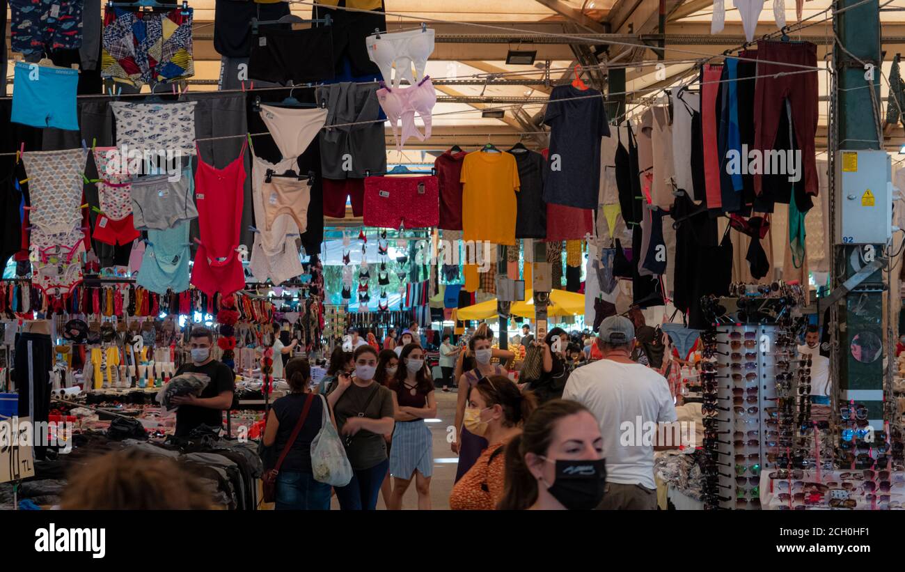 Karsiyaka, izmir / turkey - 09.09.2020: in wednesday grand bostannli bazaar, people walking on corridors and between stands and shopping. Stock Photo