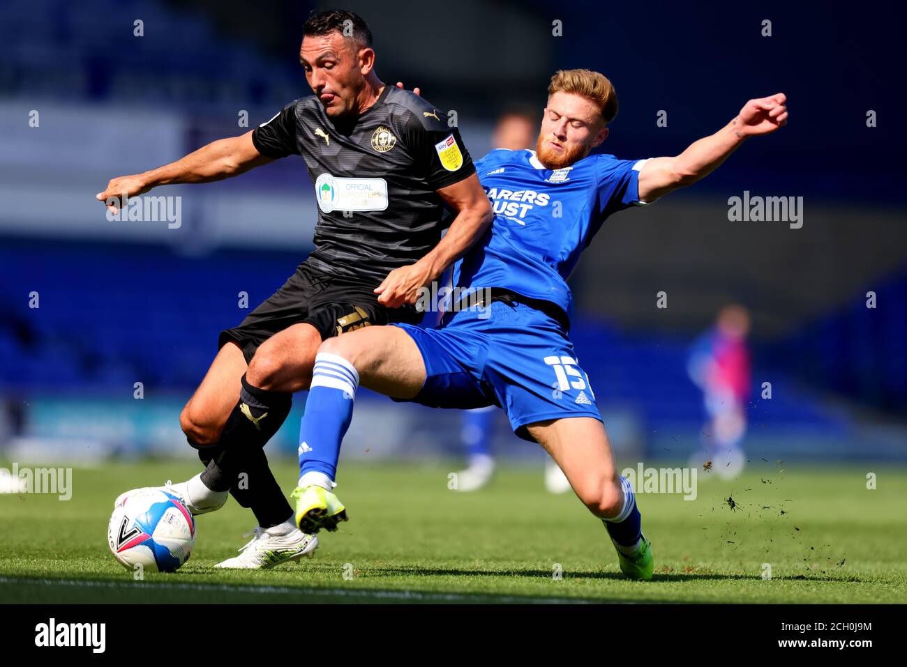13th September 2020; Portman Road, Ipswich, Suffolk, England, English League One Footballl, Ipswich Town versus Wigan Athletic; Teddy Bishop of Ipswich Town tackles Gary Roberts of Wigan Athletic Stock Photo