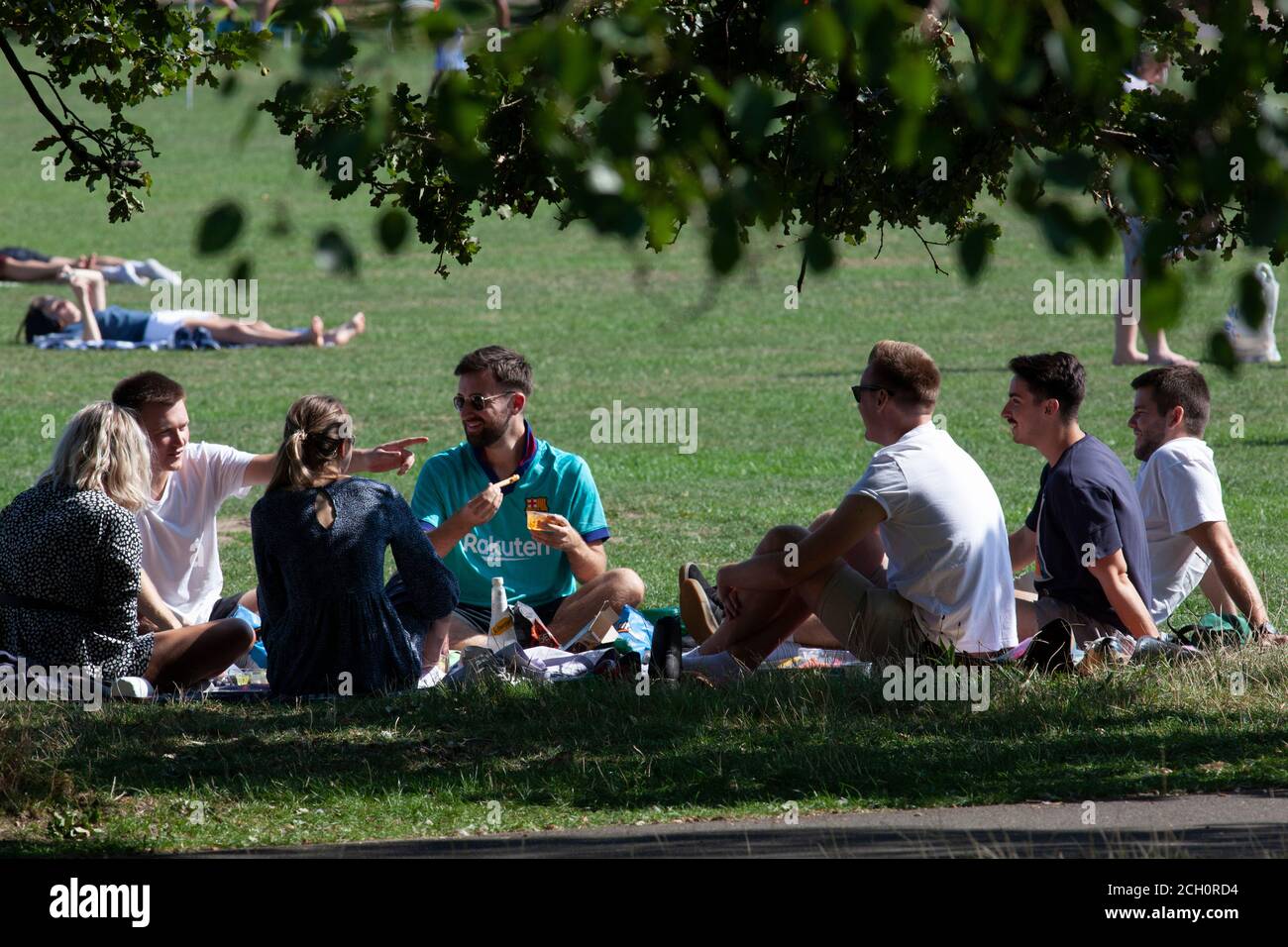 London, UK. 13 Sept 2020: Londoners took advantage of sunny weather to picnic and do sports on Clapham Common the day before social distancing rules will change. Anna Watson/Alamy Live news Stock Photo