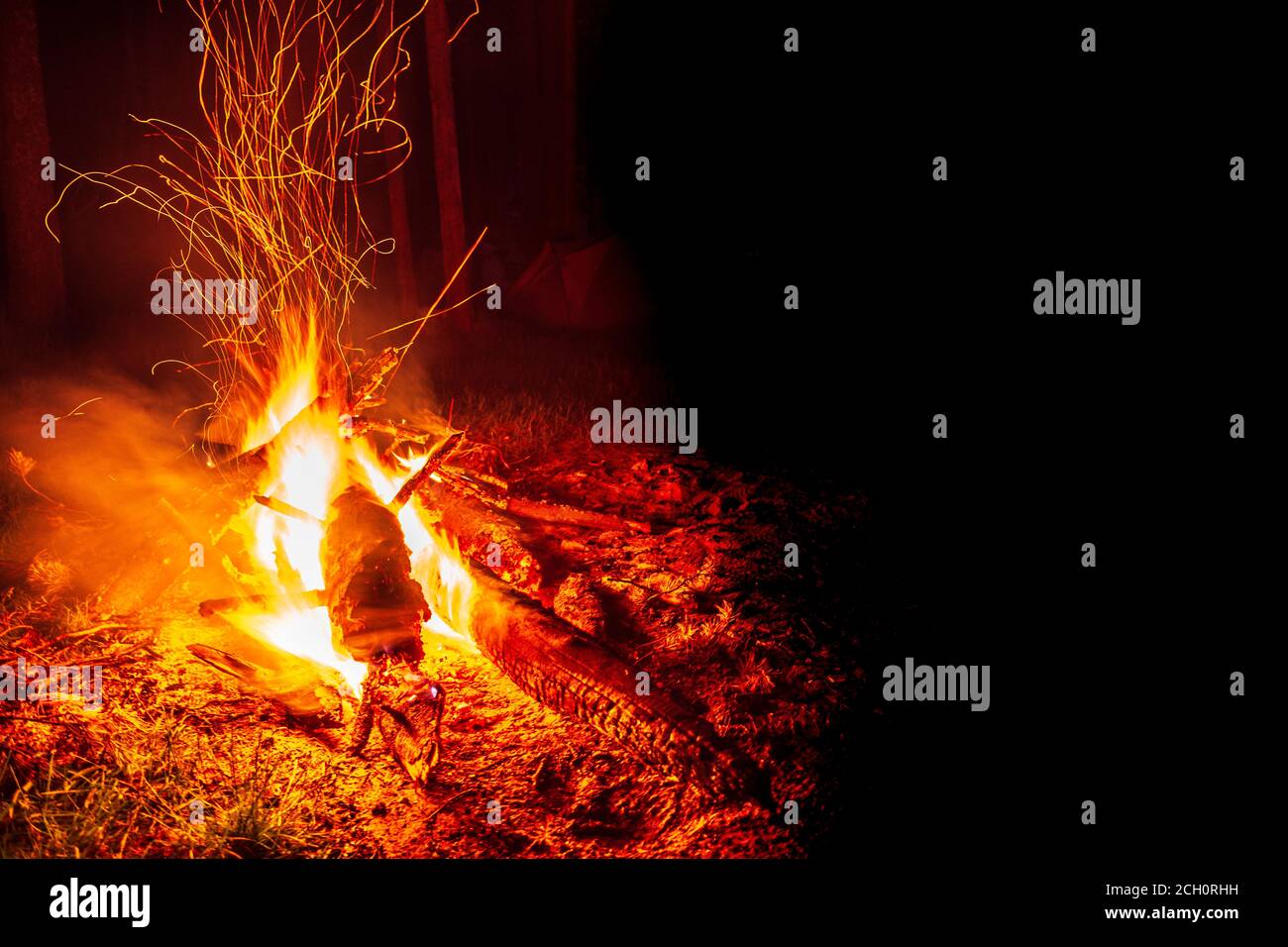 bonfire at night in the forest, sparks from a fire Stock Photo - Alamy