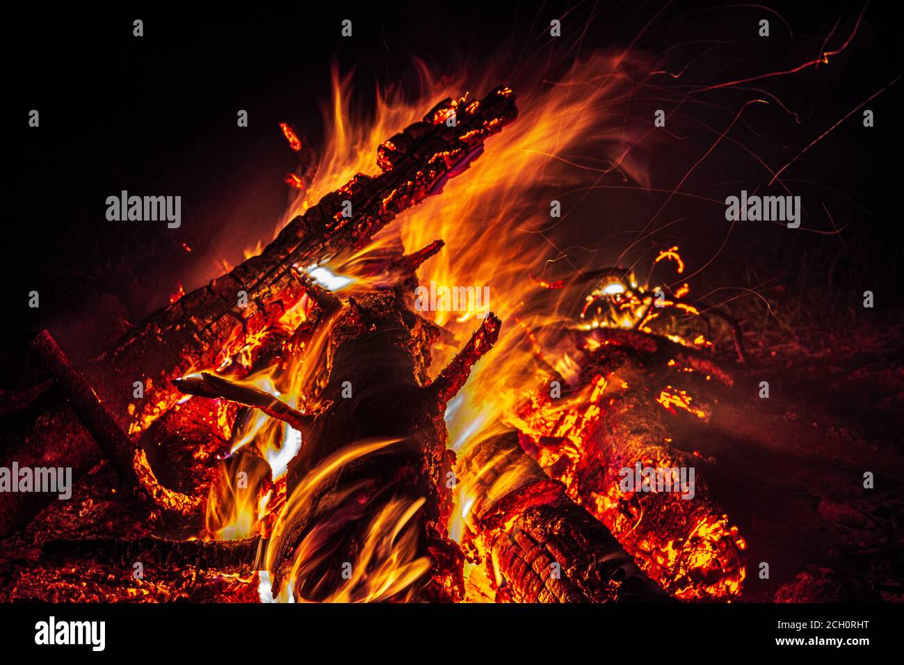 bonfire at night in the forest, sparks from a fire Stock Photo - Alamy