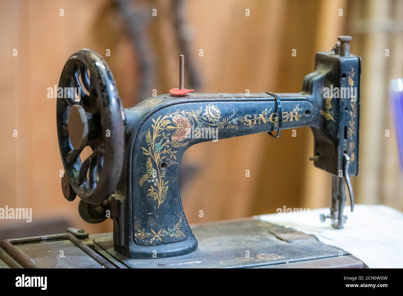 Aldershot, UK - 5/9/2020: Vintage old Singer Sewing machine on display in an exhibit in an army museum in the uK Stock Photo