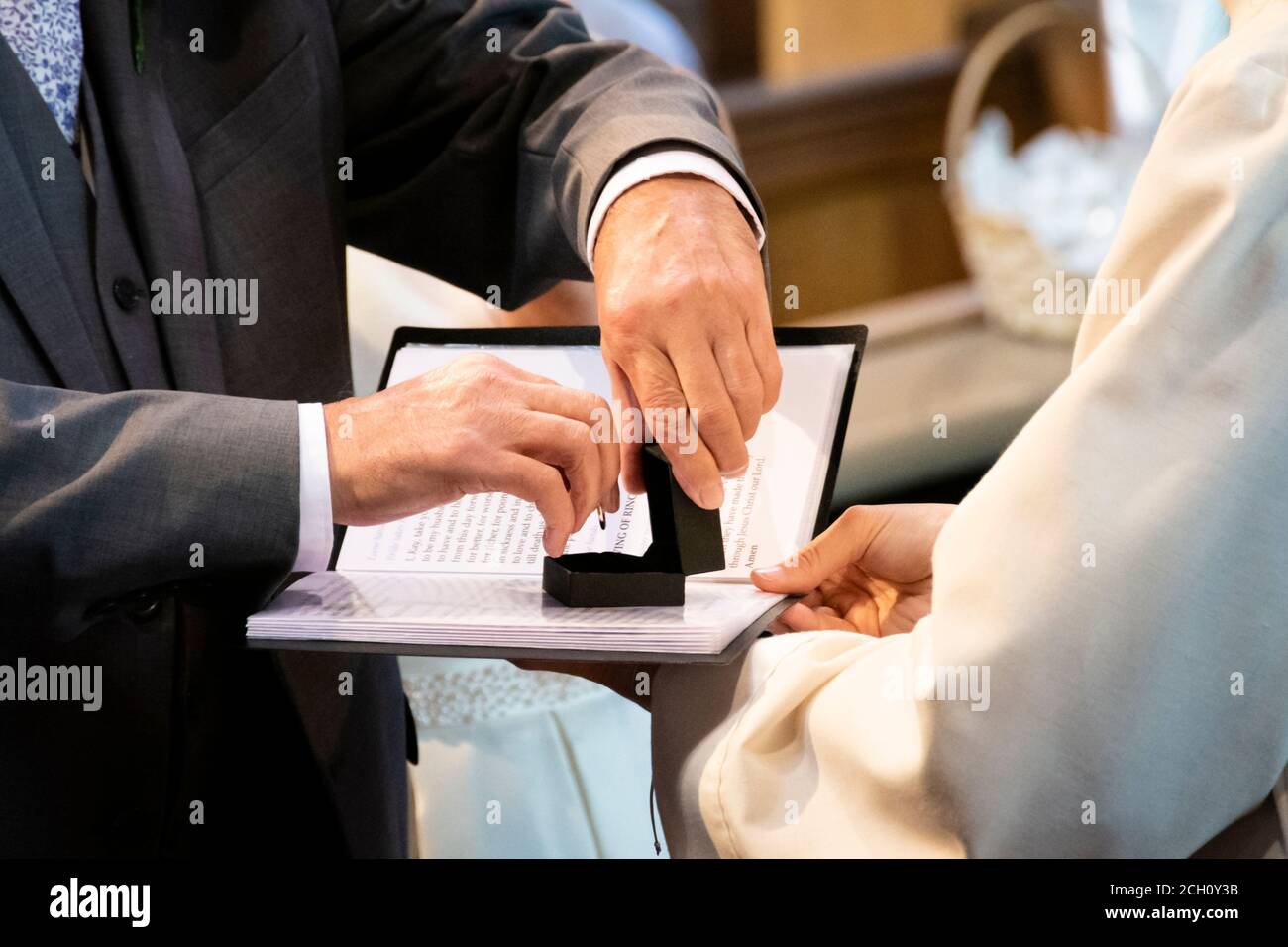 Wedding day hands with wedding ring. Stock Photo
