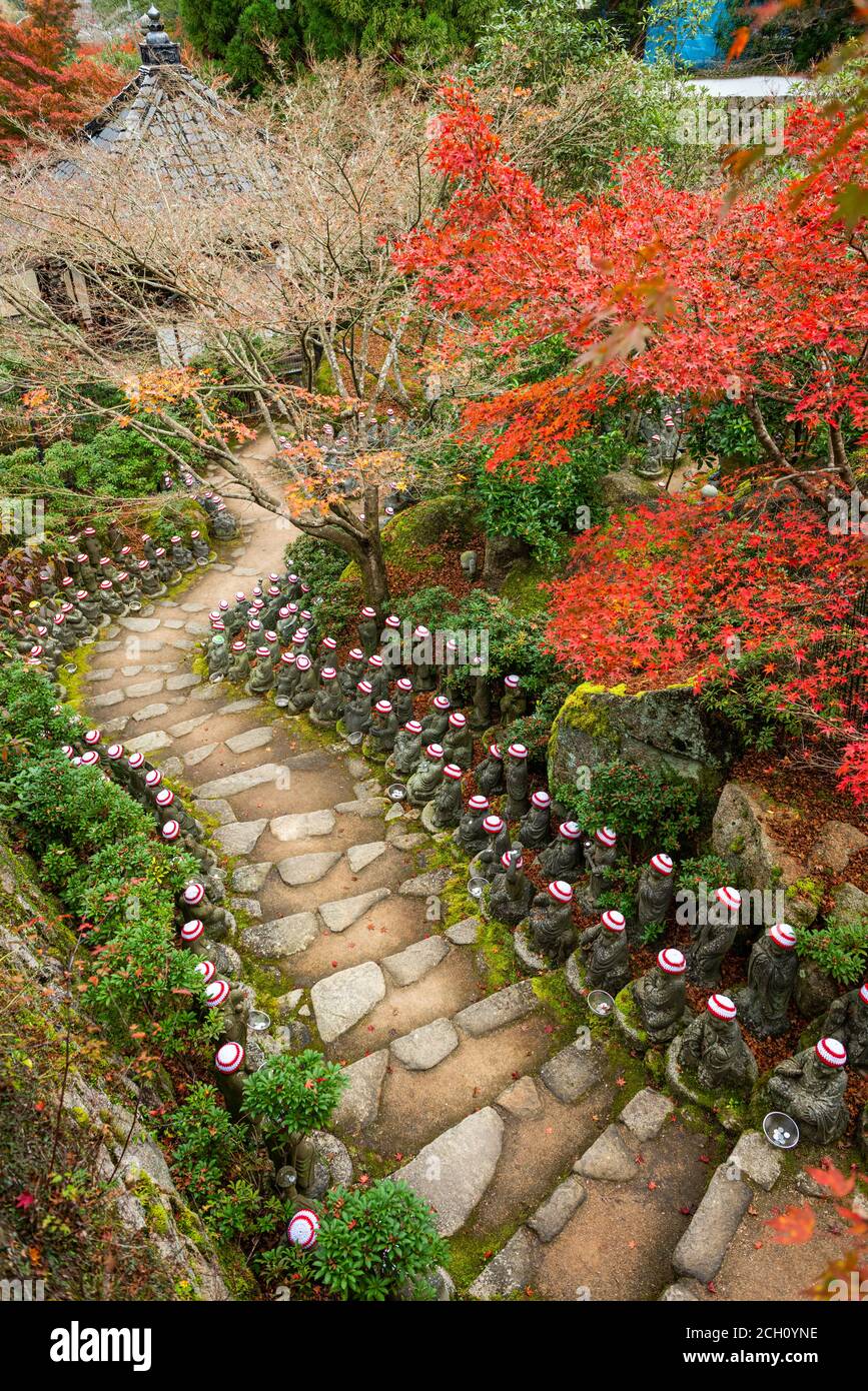 Miyajima Island, Hiroshima, Japan at the buddha lined pathways at Daisho-in Temple grounds. Stock Photo