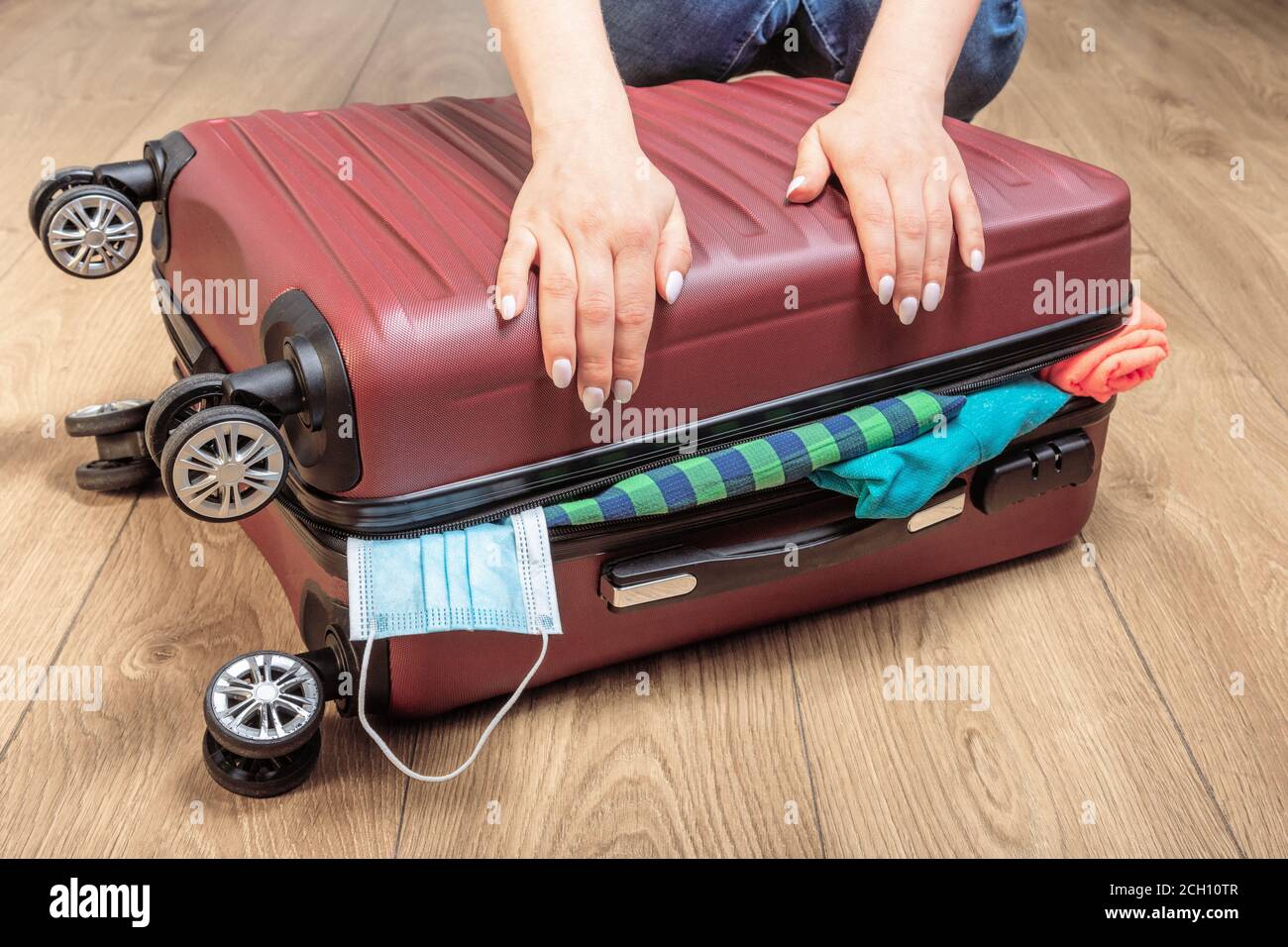 Premium Photo  Packing a suitcase for moving or traveling adult