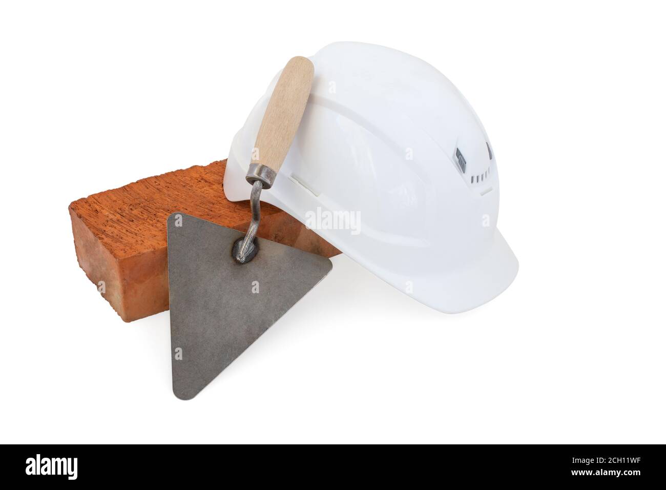 Bricklayer tools. Mason tools - Trowel, bricks and white helmet isolated on white background Stock Photo