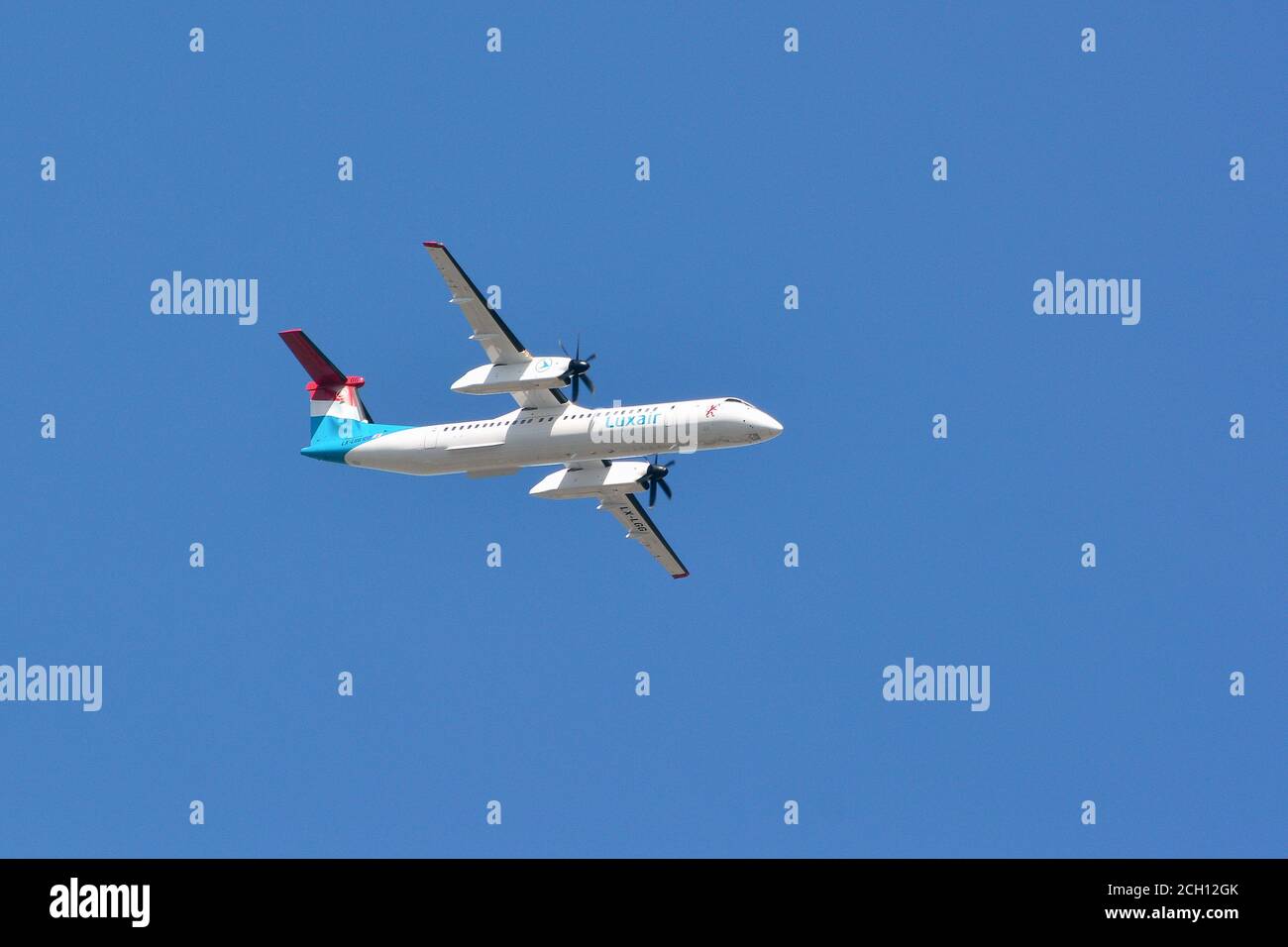 Luxair (is the flag carrier airline of Luxembourg), De Havilland Canada Dash airplane Stock Photo