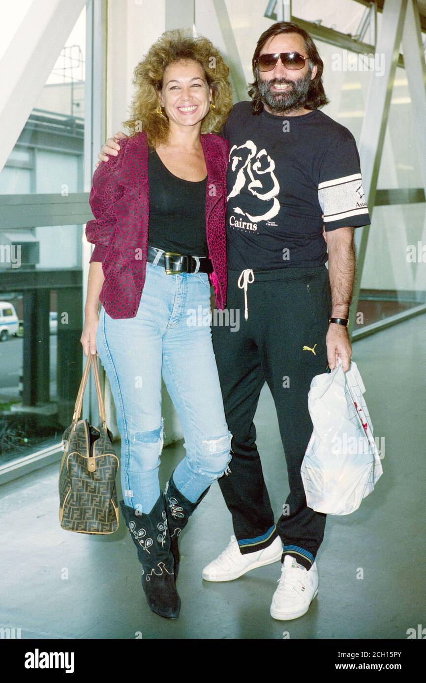 Football Legend George Best & girlfriend Mary Shatila at London Heathrow Airport UK Stock Photo