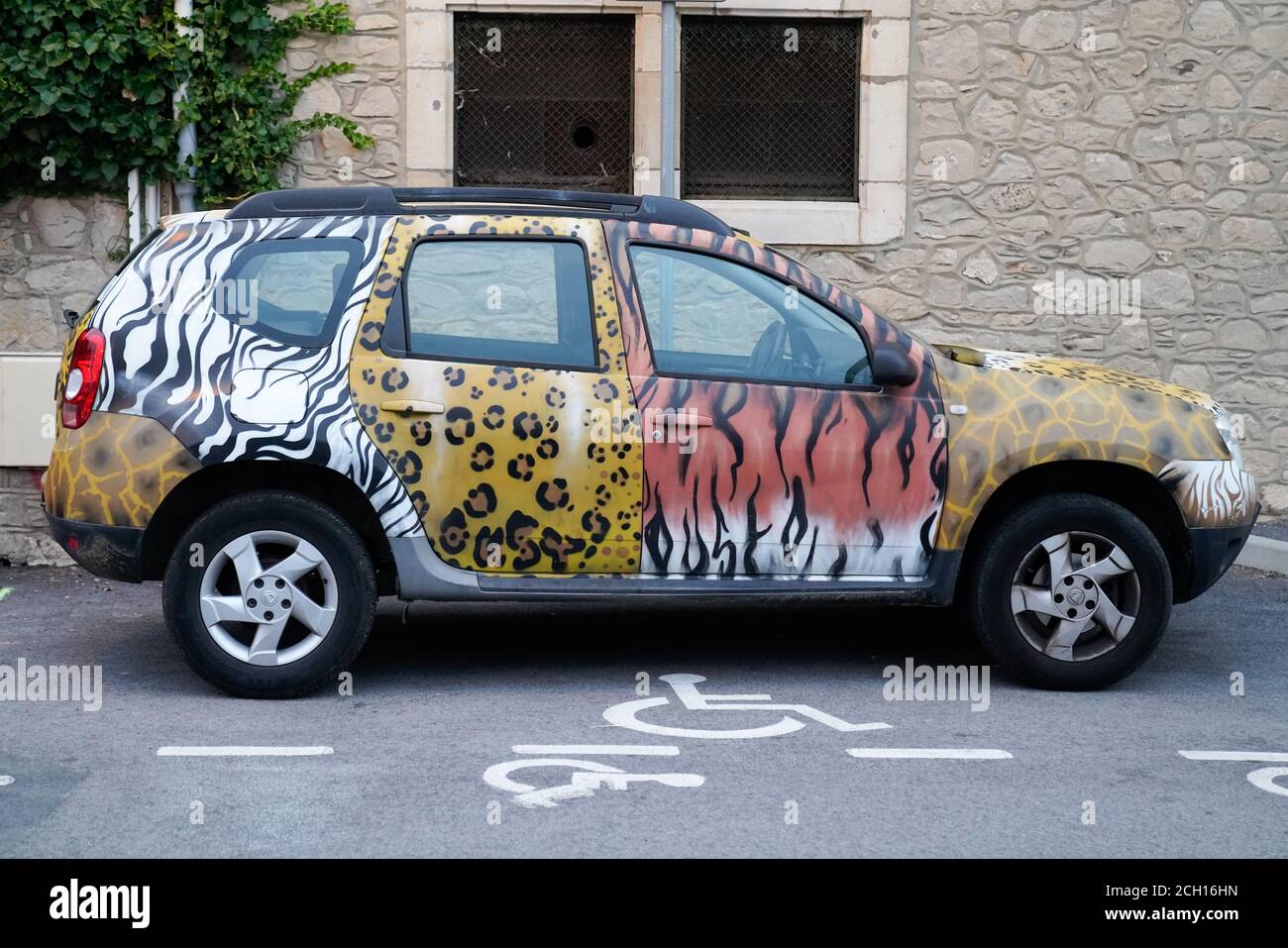 Bordeaux , Aquitaine / France - 09 01 2020 : dacia duster renault suv car with animal paint or stickers covering jungle zebra Stock Photo