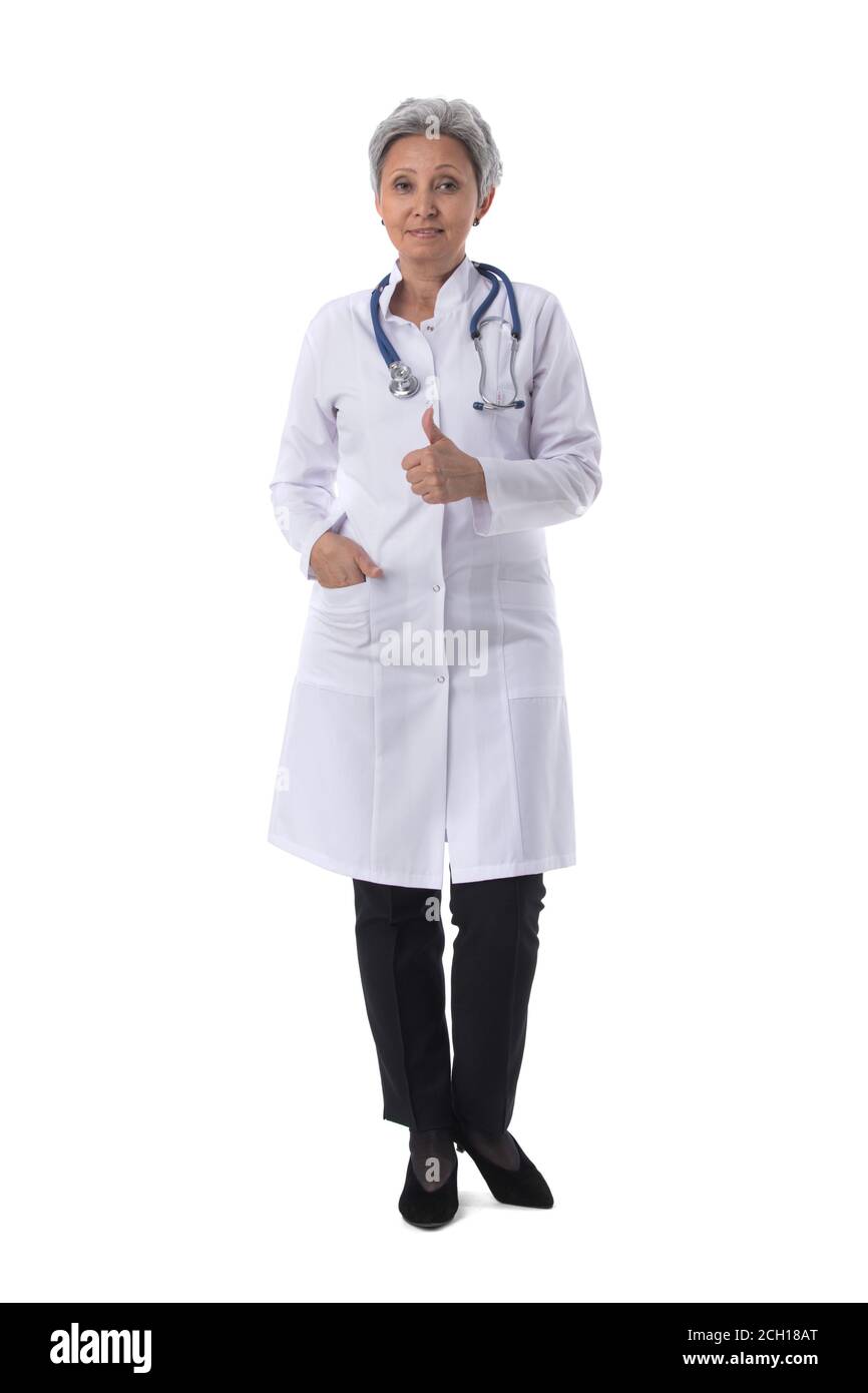 Asian mature female medical doctor with stethoscope isolated on white background, full length portrait Stock Photo