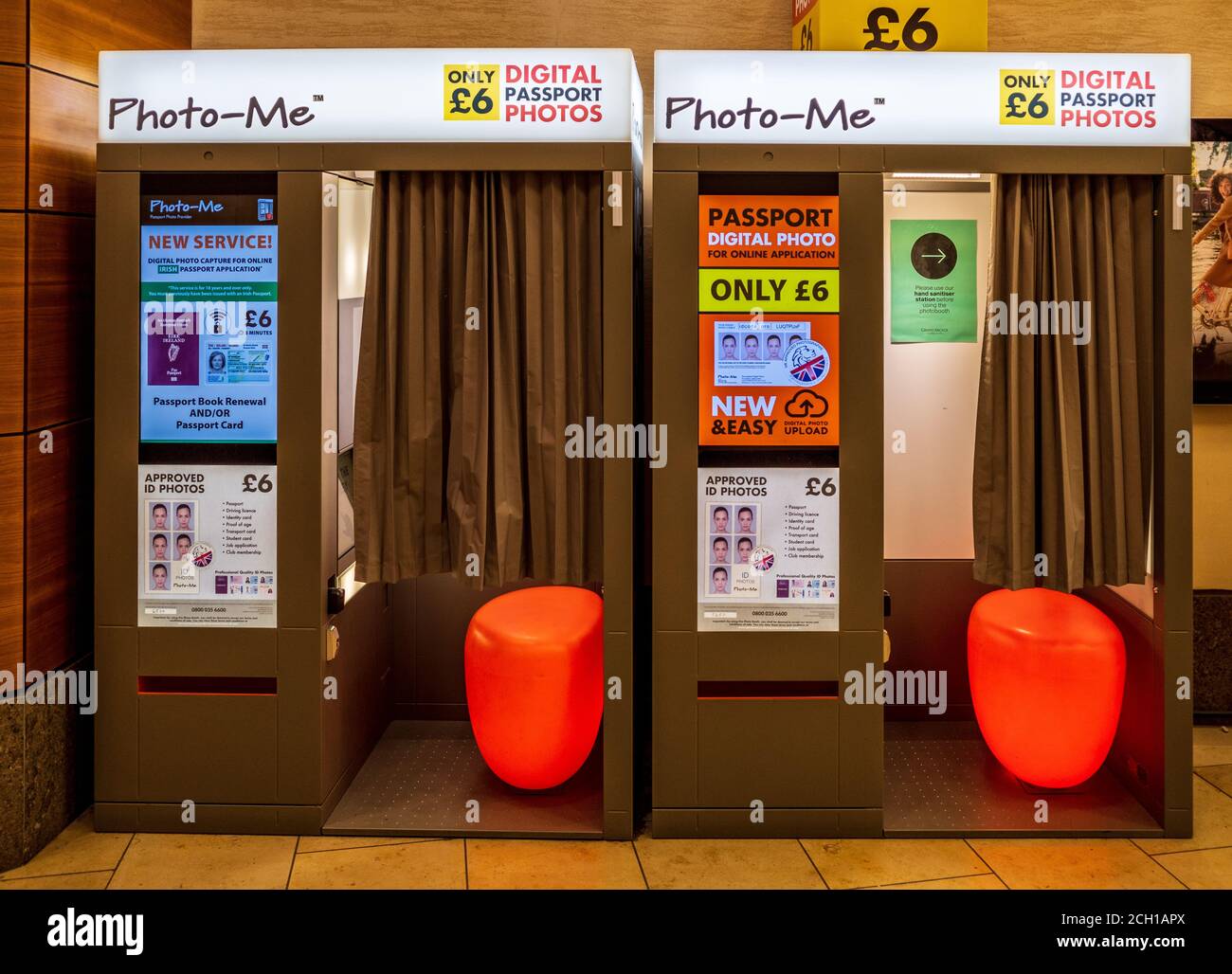 Photo-Me Passport Photo Booths in a shopping centre. Photo Me automatic photo booth. Stock Photo