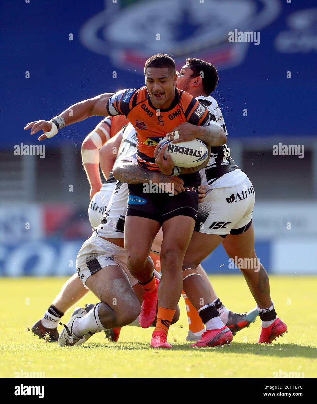 Castleford Tigers Peter Mata'utia is tackled by Hull FC’s Albert Kelly during the Betfred Super League match at The Totally Wicked Stadium, St Helens. Stock Photo