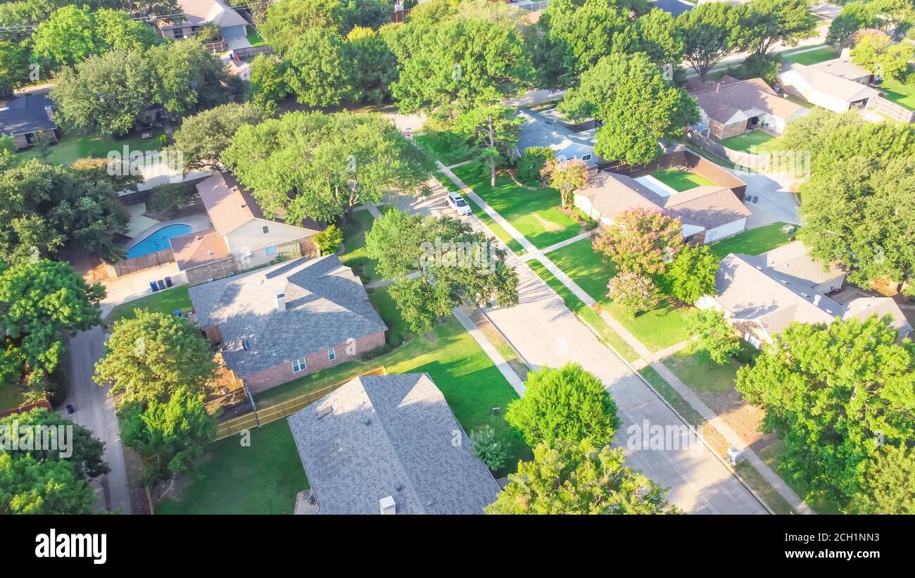 Bird eye view clean and peaceful neighborhood streets with row of