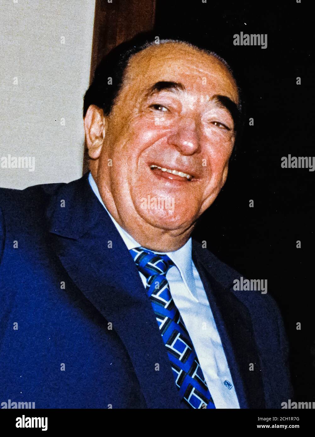 In this file photo from September 25, 1990, disgraced publisher Robert Maxwell, meets South African Ambassador to the United States Piet G.J. Koornhof in Washington, DC on September 25, 1990. The New York Post is reporting today that Maxwell, through his daughter Ghislaine Maxwell, may have been the source the huge fortune amassed by alleged pedophile Jeffrey Epstein, who hanged himself in his Manhattan lockup last August.Credit: Ron Sachs/CNP | usage worldwide Stock Photo