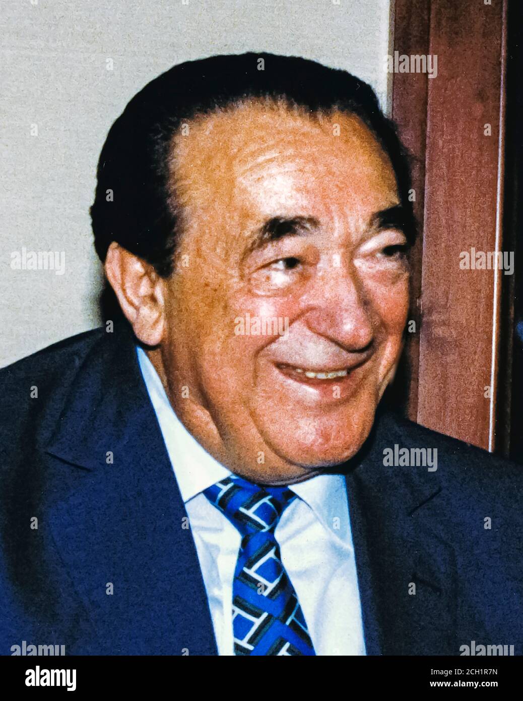 In this file photo from September 25, 1990, disgraced publisher Robert Maxwell meets South African Ambassador to the United States Piet G.J. Koornhof in Washington, DC on September 25, 1990. The New York Post is reporting today that Maxwell, through his daughter Ghislaine Maxwell, may have been the source the huge fortune amassed by alleged pedophile Jeffrey Epstein, who hanged himself in his Manhattan lockup last August.Credit: Ron Sachs/CNP | usage worldwide Stock Photo