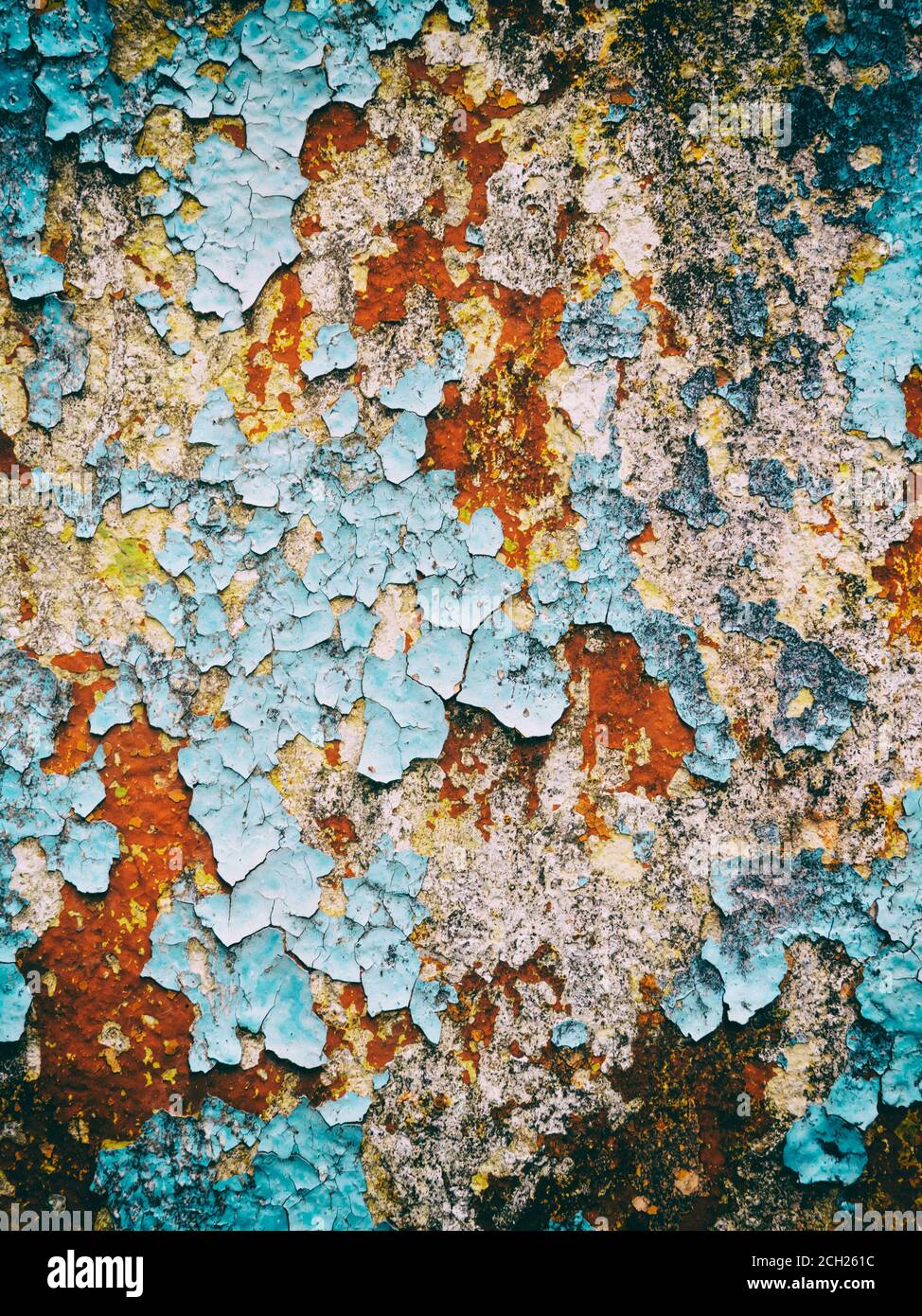 background old concrete wall with cracked peeling  paint, texture, multicolored Stock Photo