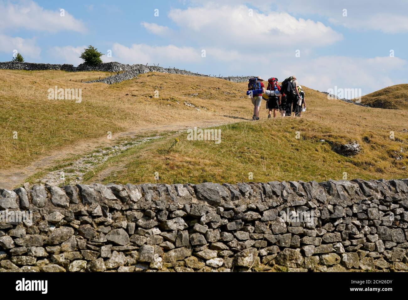 Group of people hiking in Derbyshire England UK Stock Photo Alamy