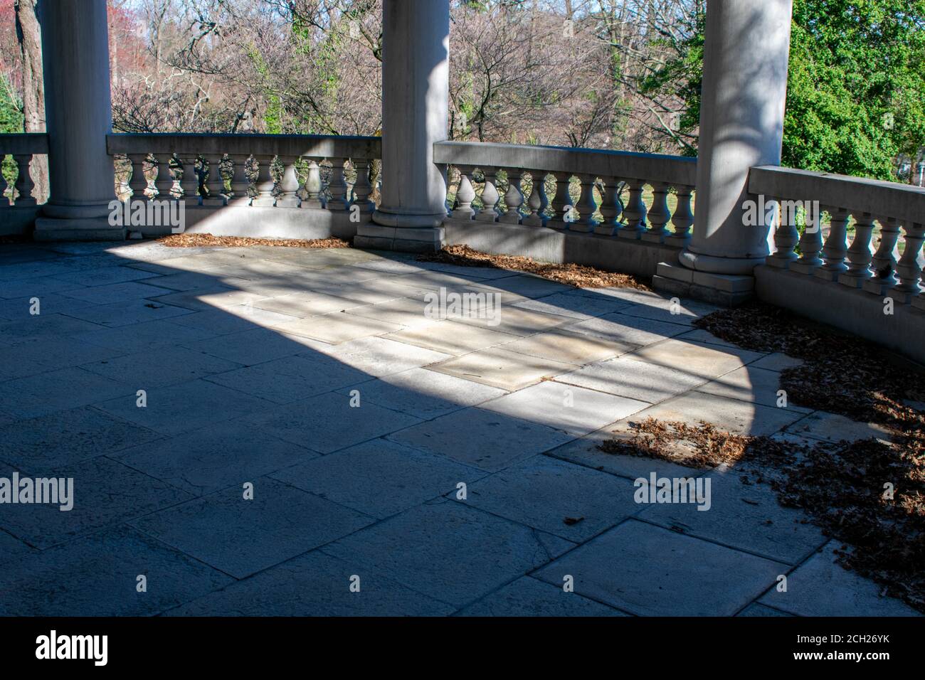 A Large Balcony Floor Covered in Dead Orange Leaves at Elkins Estate