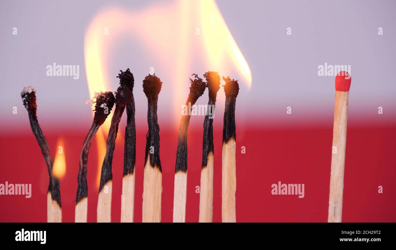Coronavirus outbreak, social distancing concept. Burning matches on Poland flag background. Concept: spreading virus mechanism. COVID-19 Stock Photo