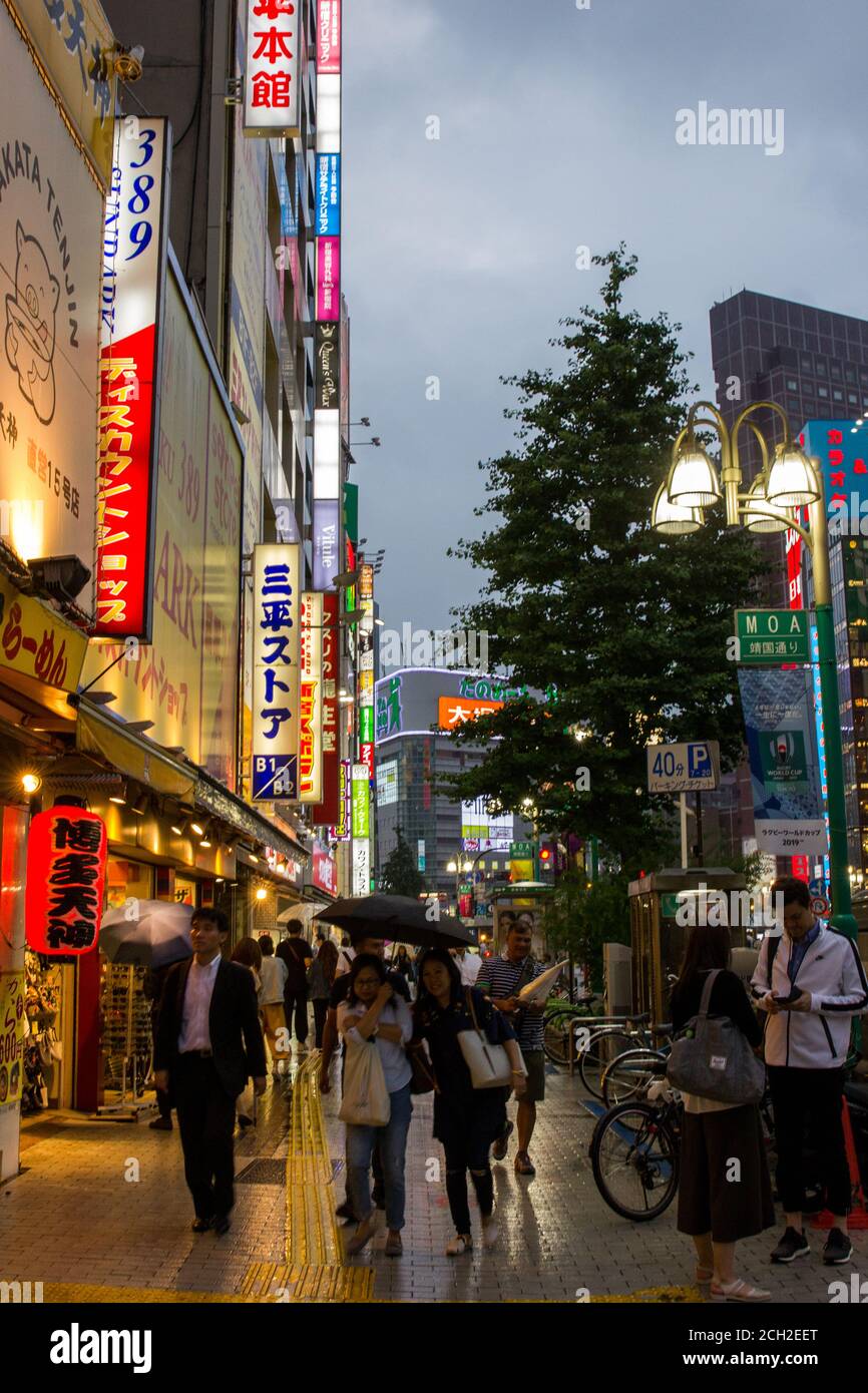 Shibuya, Tokyo Japan - June 2018:  Colorful city lights at night in the busy Shibuya district of Tokyo, Japan. Stock Photo