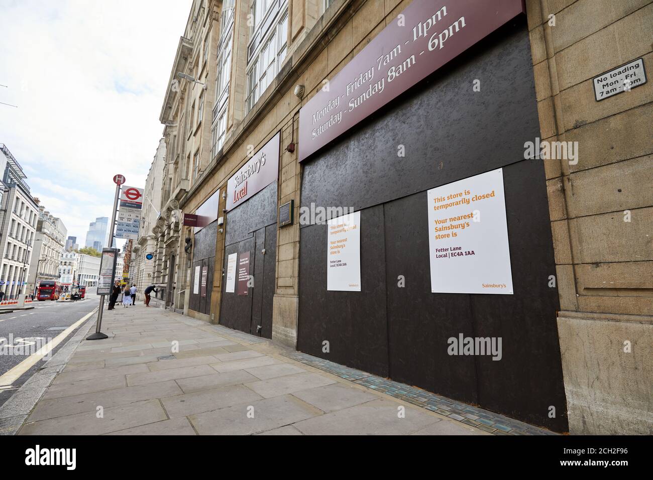 London, UK. - 10 Sept 2020: A local Sainsburys store boarded-up after being shut during the coronavirus pandemic. The normally busy store is on Fleet Street in the City of London. Stock Photo