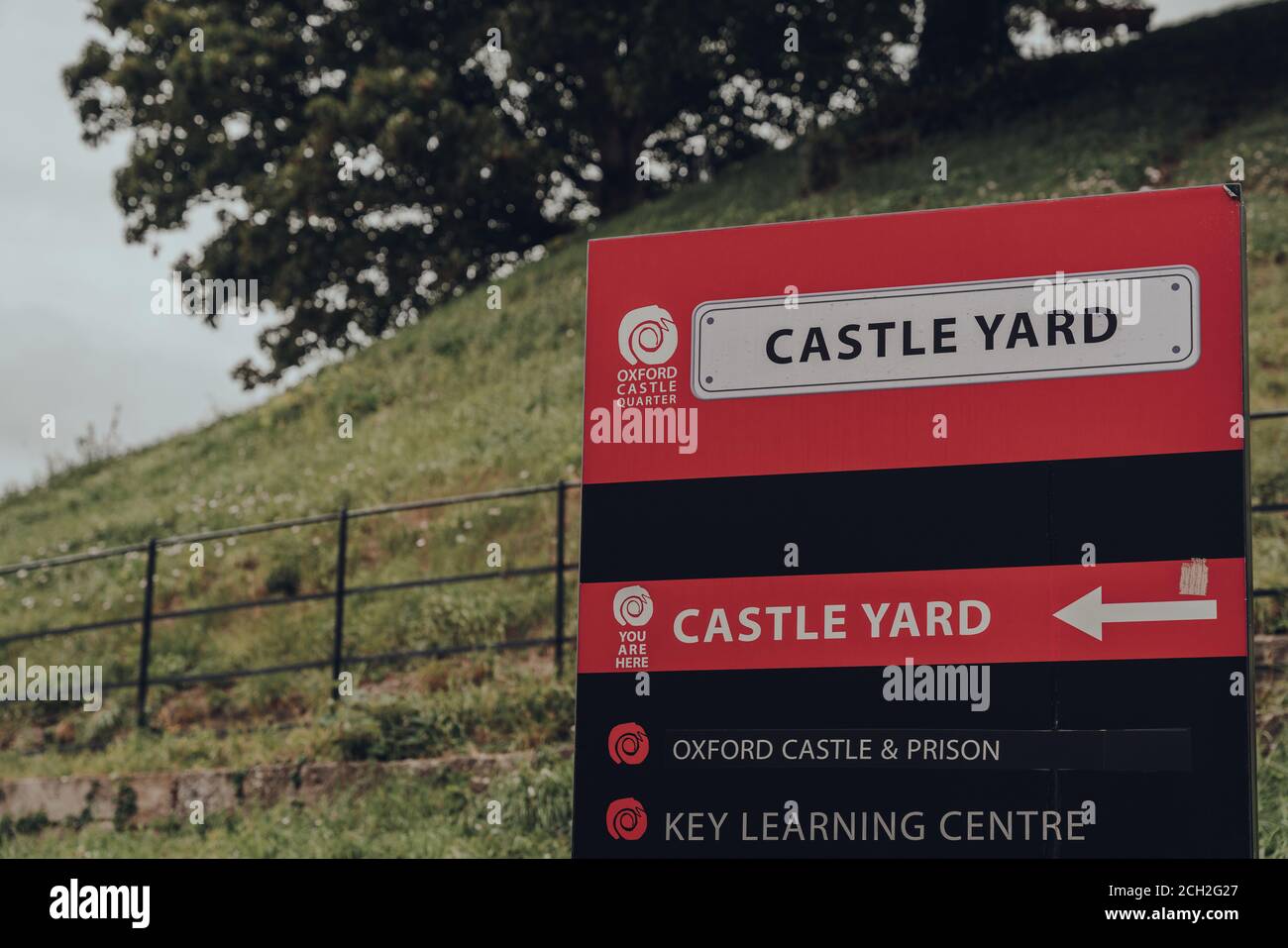 Oxford, UK - August 04, 2020: Close up of a directional sign in Oxford Castle Quarter, an area of the city housing Oxford Castle and Prison with a his Stock Photo