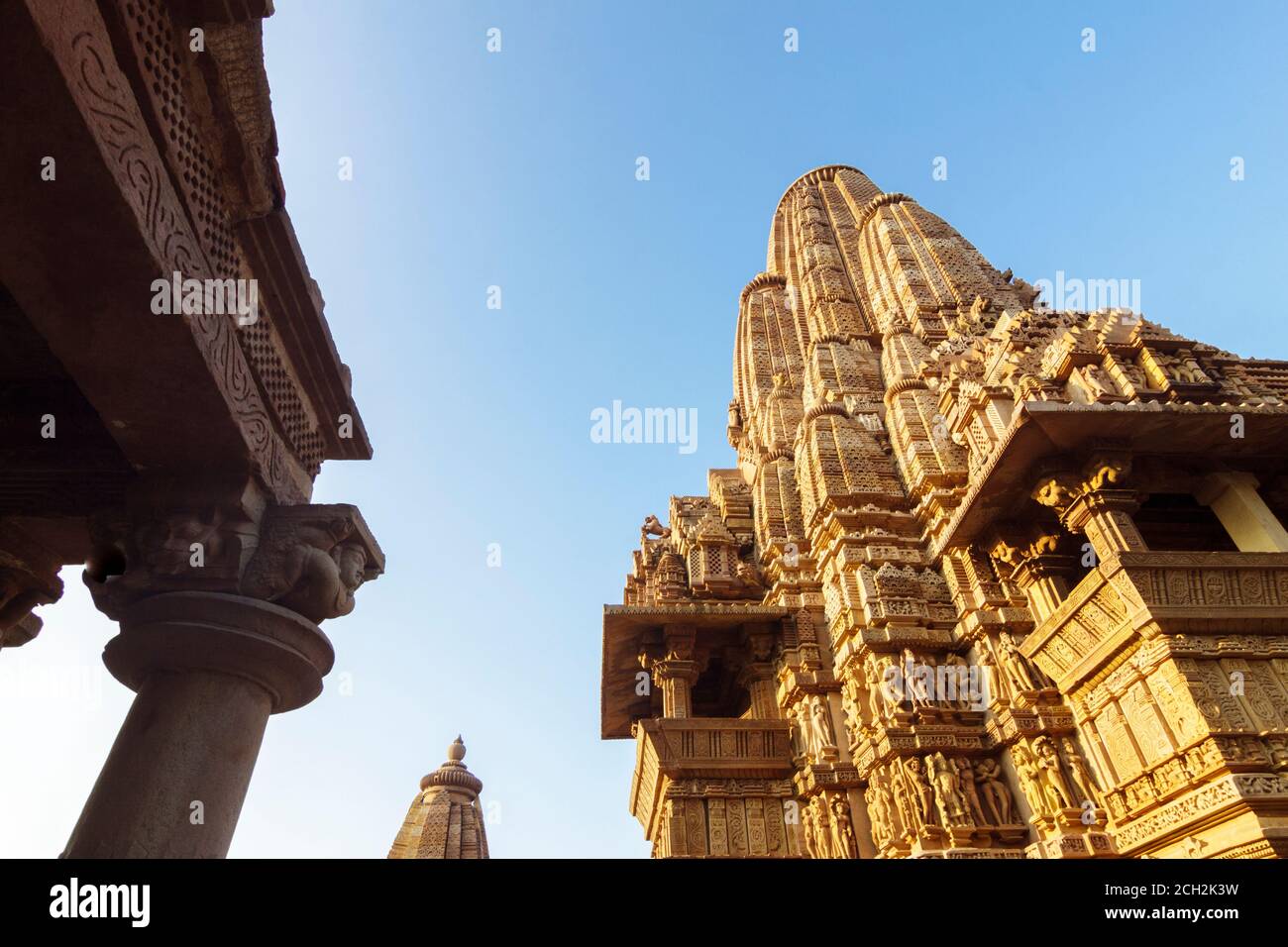 Khajuraho, Madhya Pradesh, India : Low angle of the main tower of the Kandariya Mahadeva Temple part of the western group of the UNESCO World Heritage Stock Photo