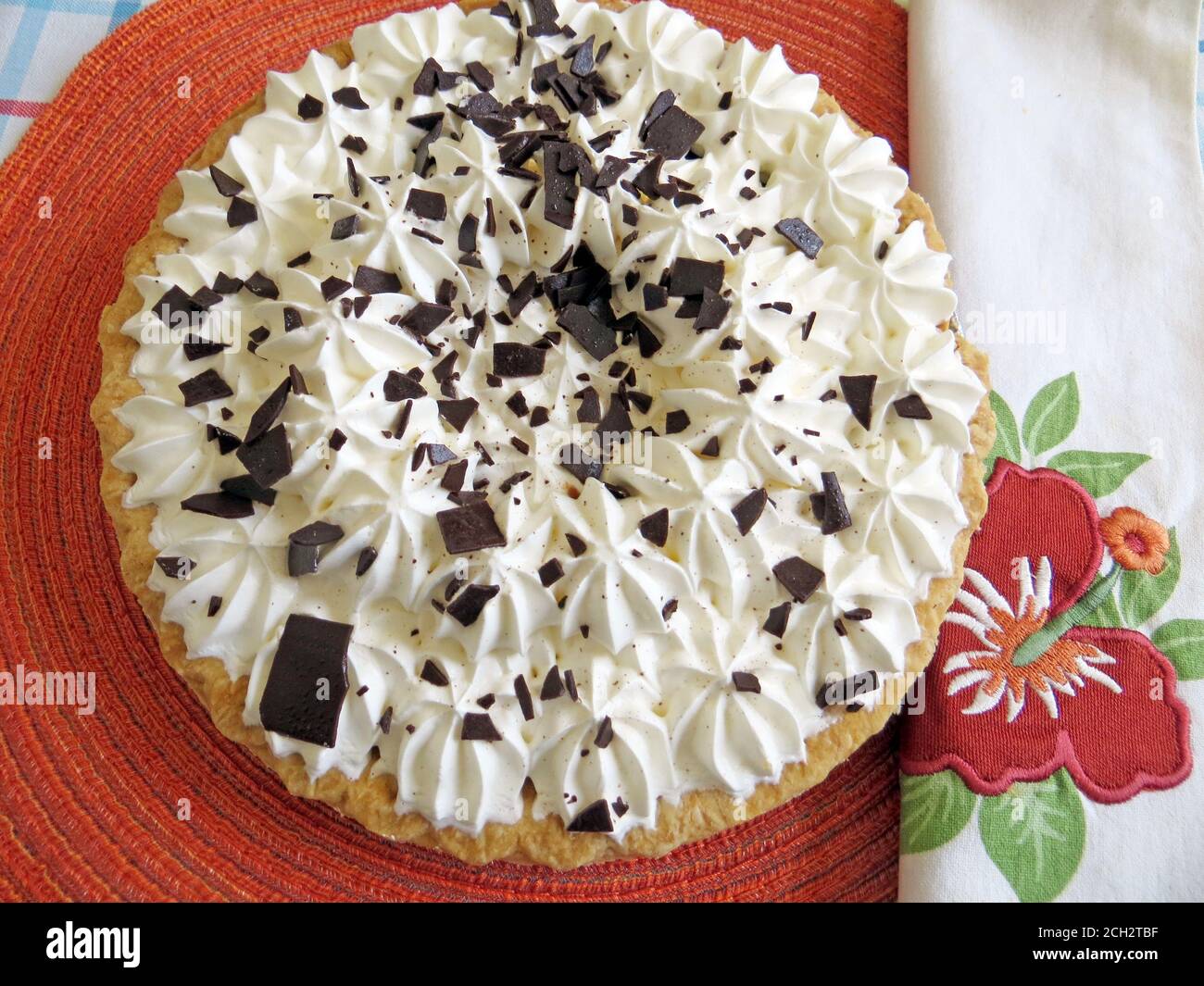 Chocolate pie  with whipped cream topping and chocolate shavings Stock Photo