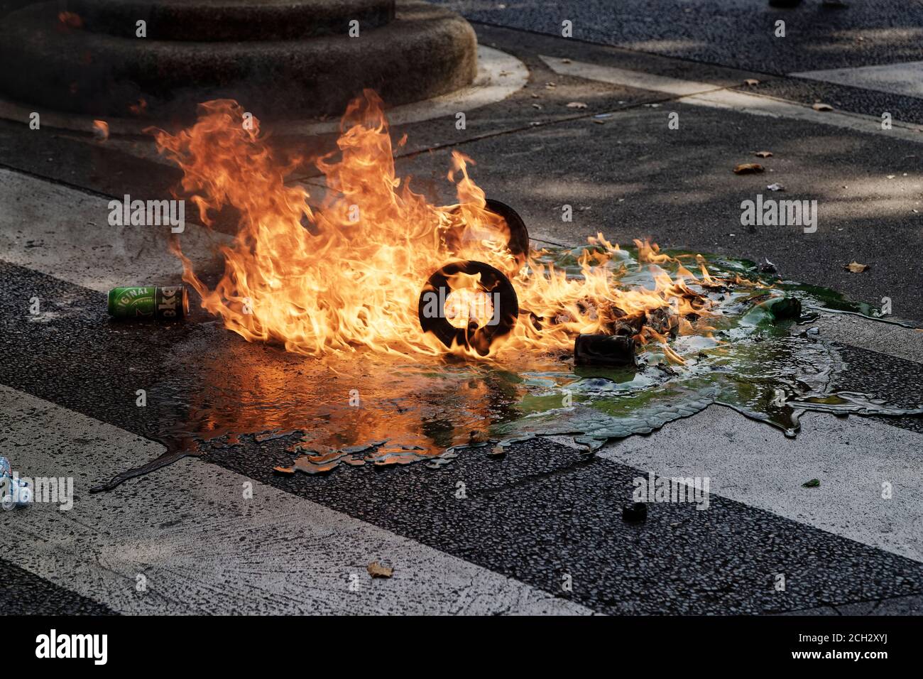 Paris, France. 12th Sept, 2020. A trash can is set on fire during the demonstration of the Yellow Vests for social and ecological justice in Paris. Stock Photo