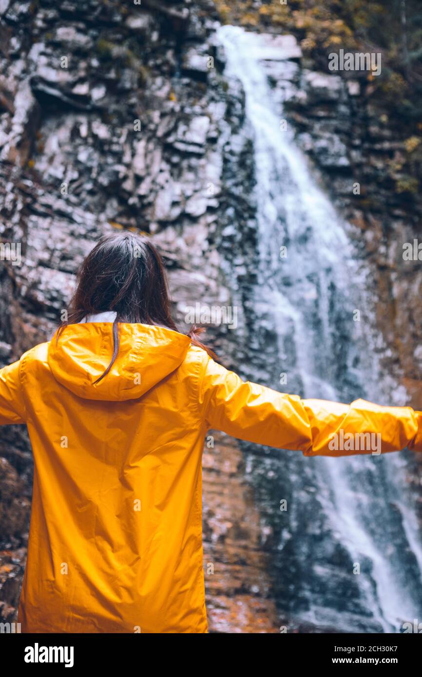 Yellow raincoat travel tourist hi-res stock photography and images - Alamy