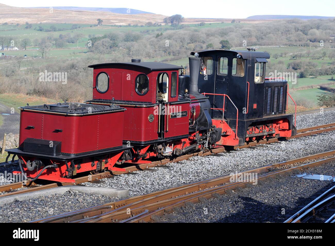 'Graf Schwerin Lowitz' and diesel locomotive outside Pant Shed. Stock Photo