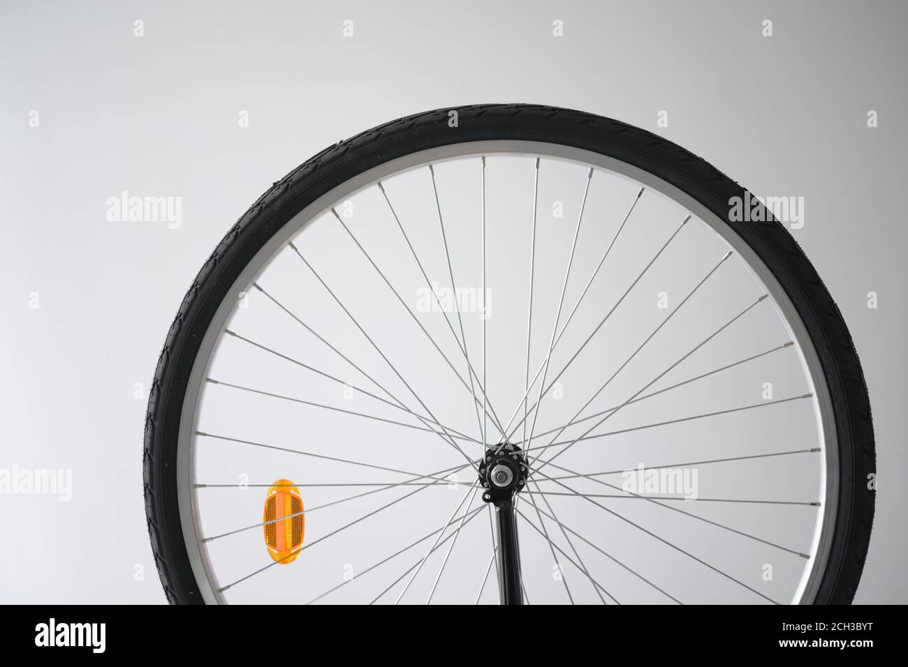 Front wheel of new bicycle indoors Stock Photo