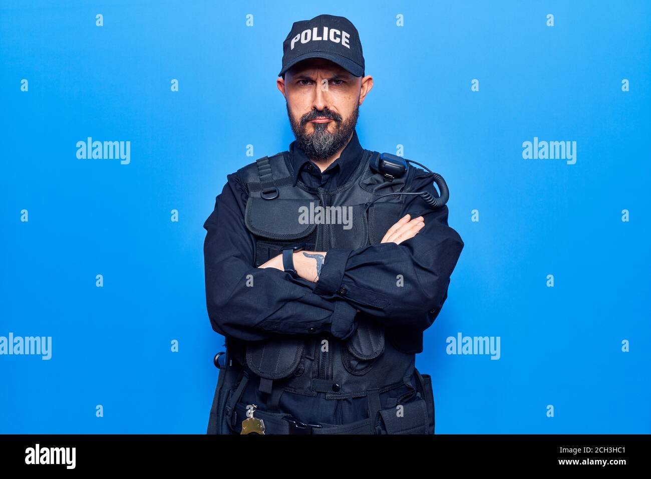 Young handsome man wearing police uniform skeptic and nervous ...