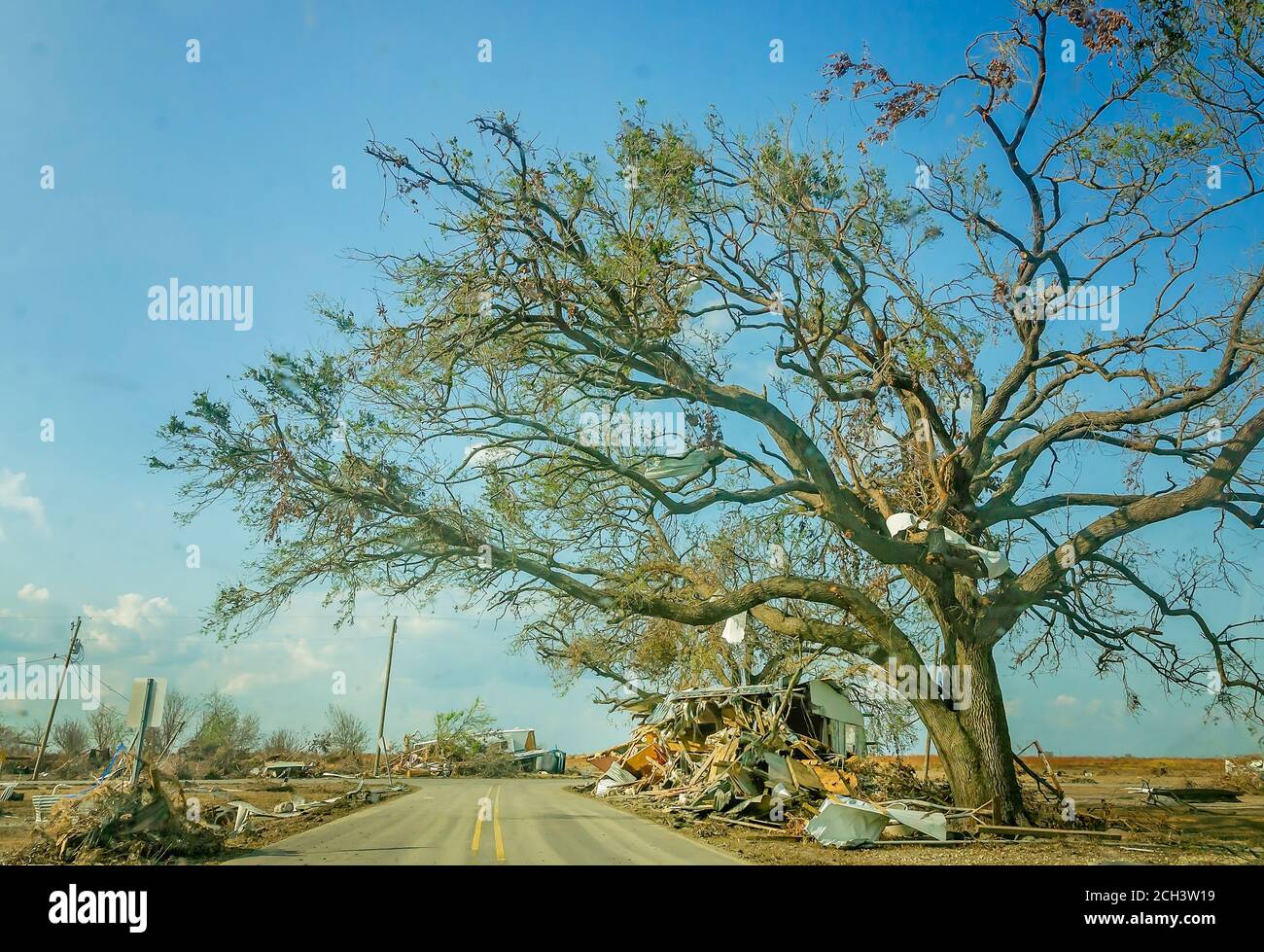 Debris surrounds a home damaged by Hurricane Laura, Sept. 11, 2020, in