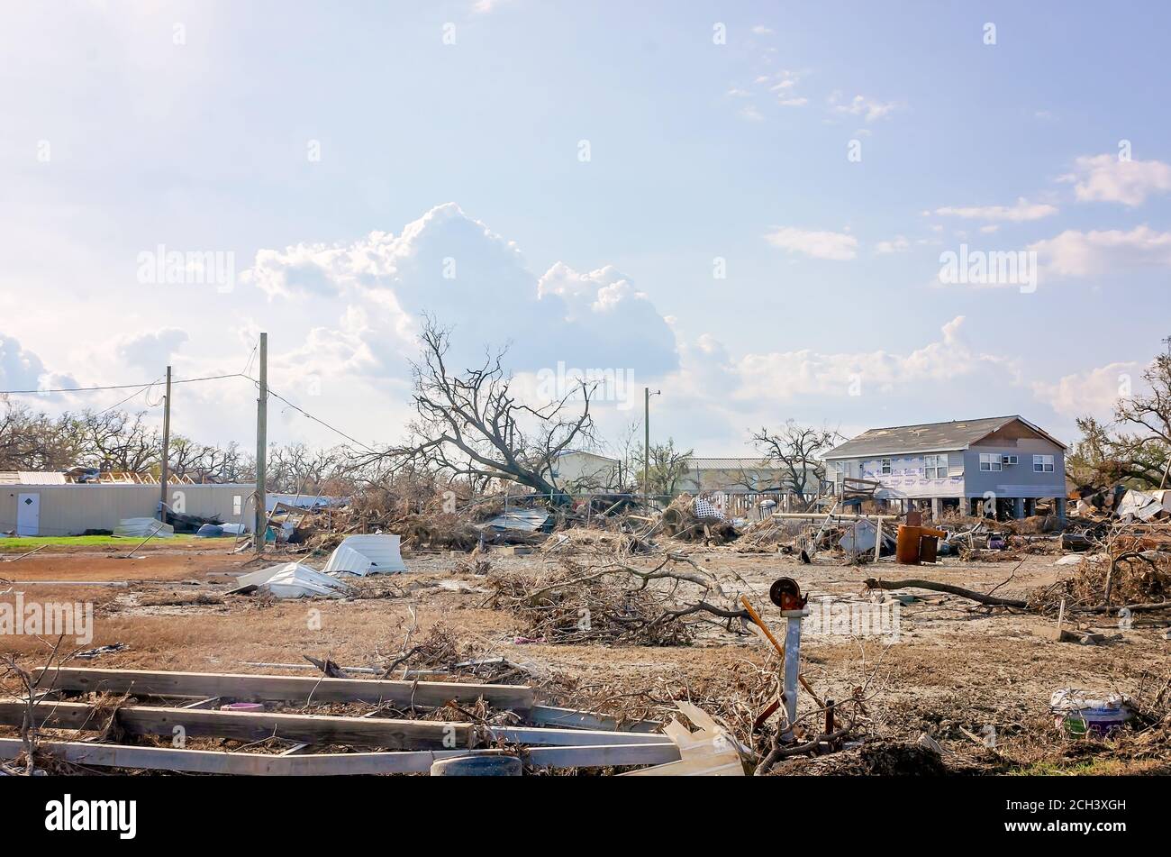 Debris surrounds a home damaged by Hurricane Laura, Sept. 11, 2020, in