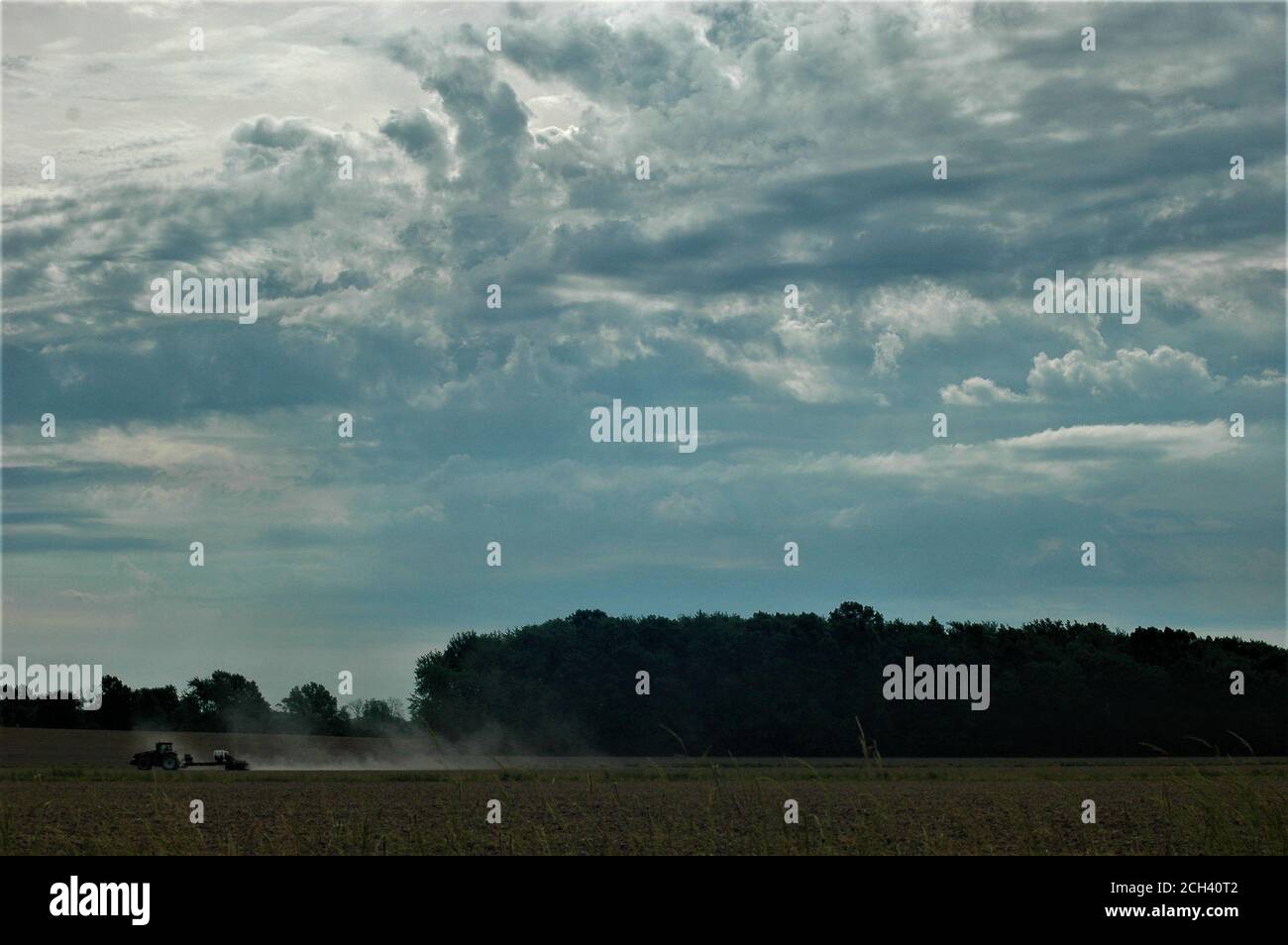 concrete angel on a blue bench Stock Photo Alamy