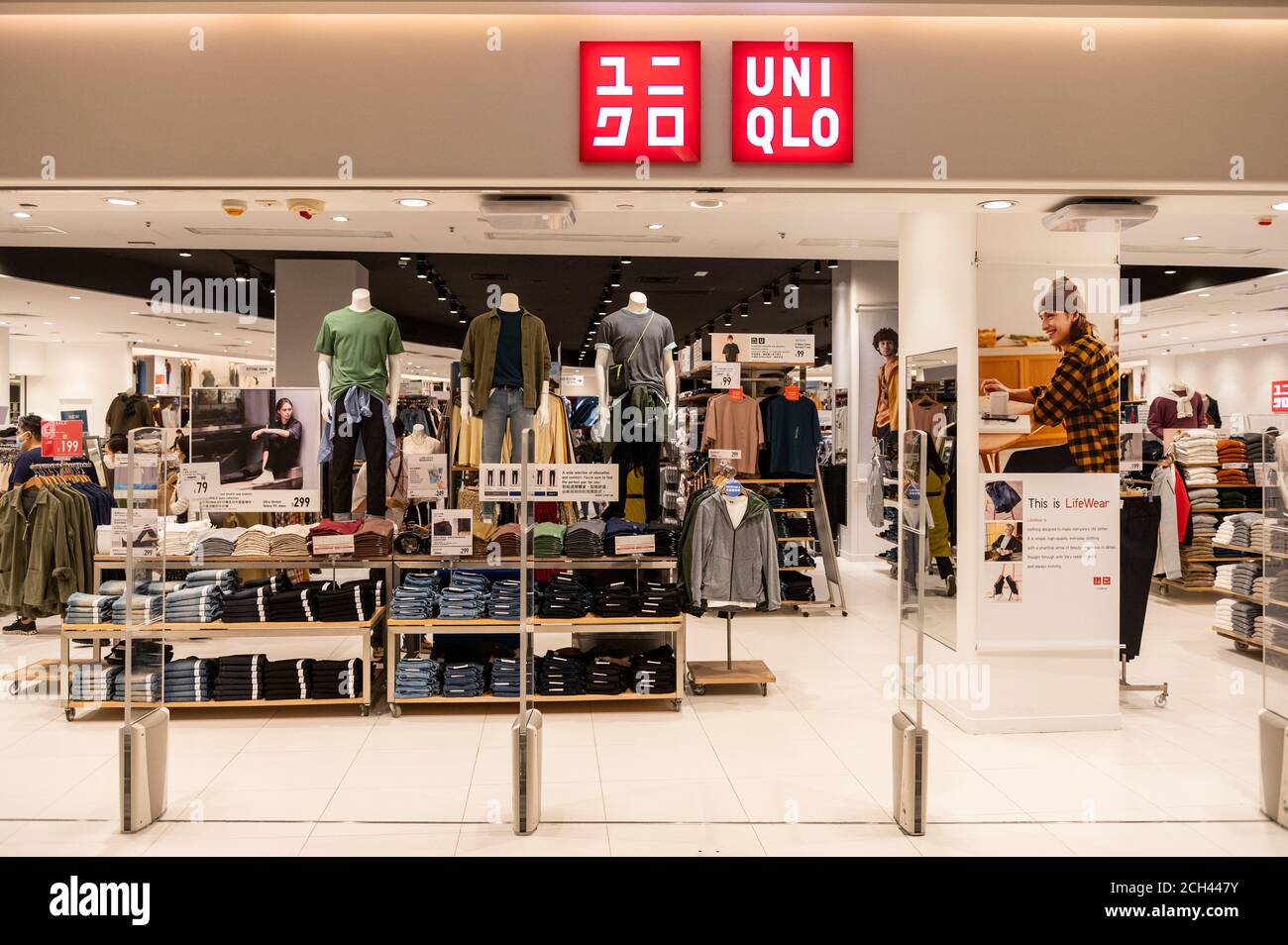 Japanese clothing brand Uniqlo logo and store in Hong Kong Stock Photo -  Alamy