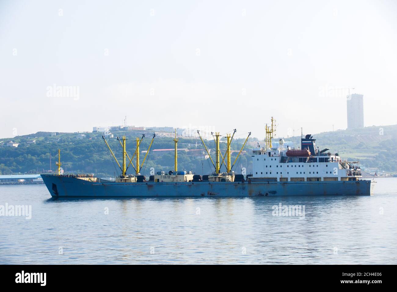 A merchant ship stands on the roadstead in the Golden Horn Bay in Vladivostok Stock Photo